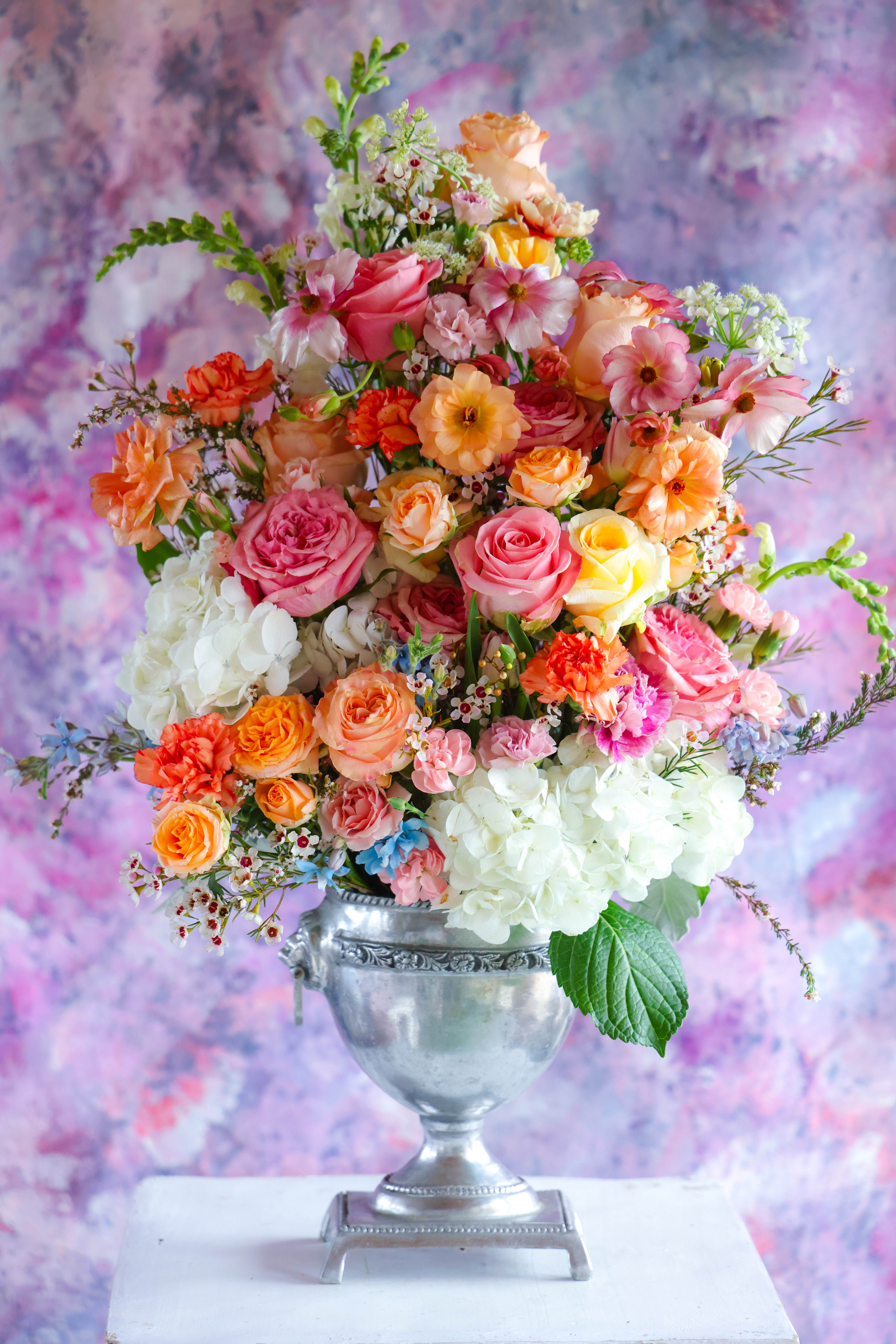 The Cloud 9 Arrangement - When OH MY and heartswoon is all that will do! Take your loved one to Cloud 9 and beyond with this floral. To be remembered always. When one with everything is the order. One of a kind by floral designer Stacy Leafsong Arrangements will be delivered by 7pm, for a specific delivery time please include in special instructions. On holidays, our busiest times, deliveries will be made by 7:30pm.