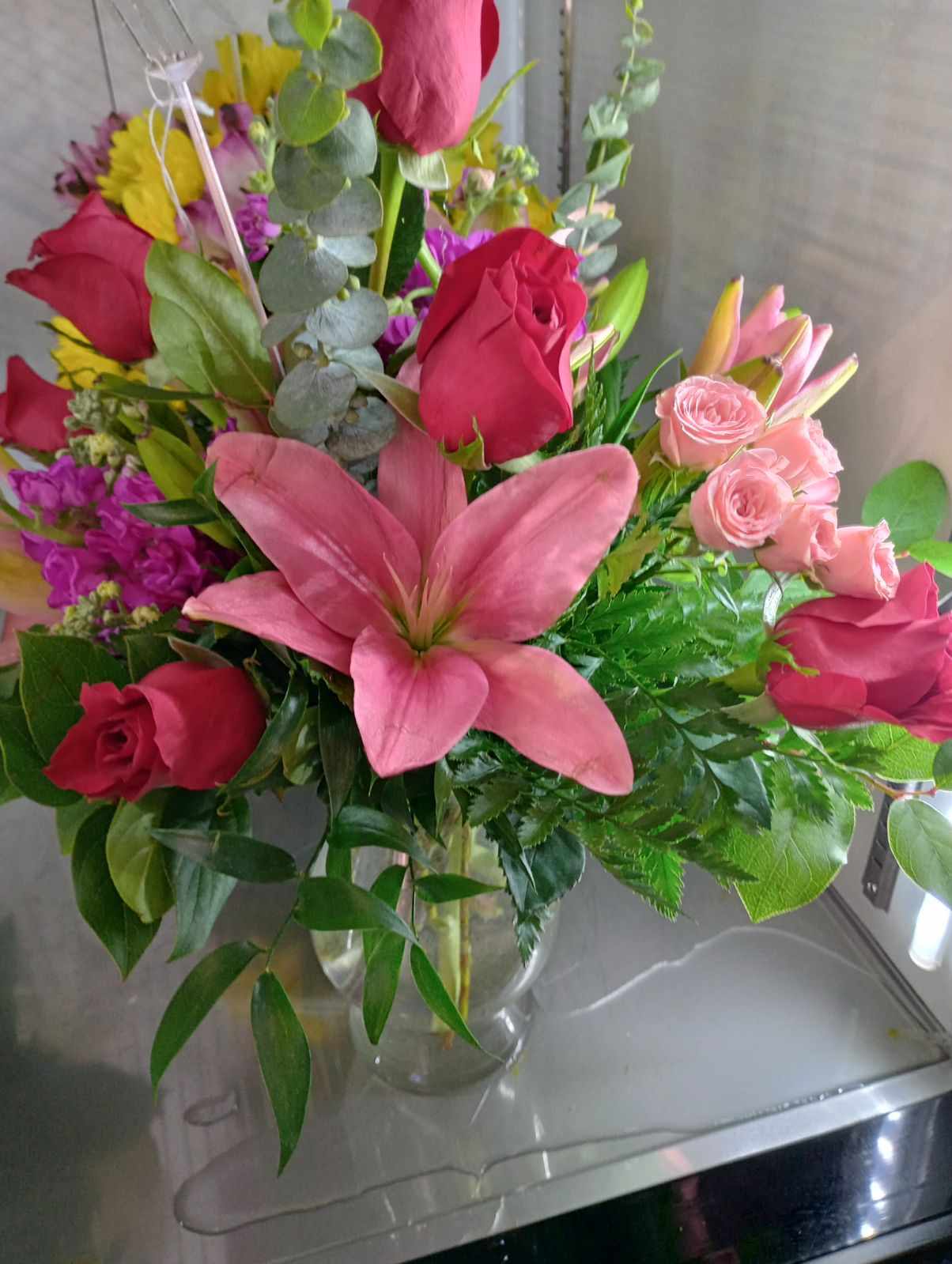 Assisstant Day Bouquet Assisstant Day Bouquet - A beautiful pink and red roses, lillies, and lush greenery make a perfect thank you gift