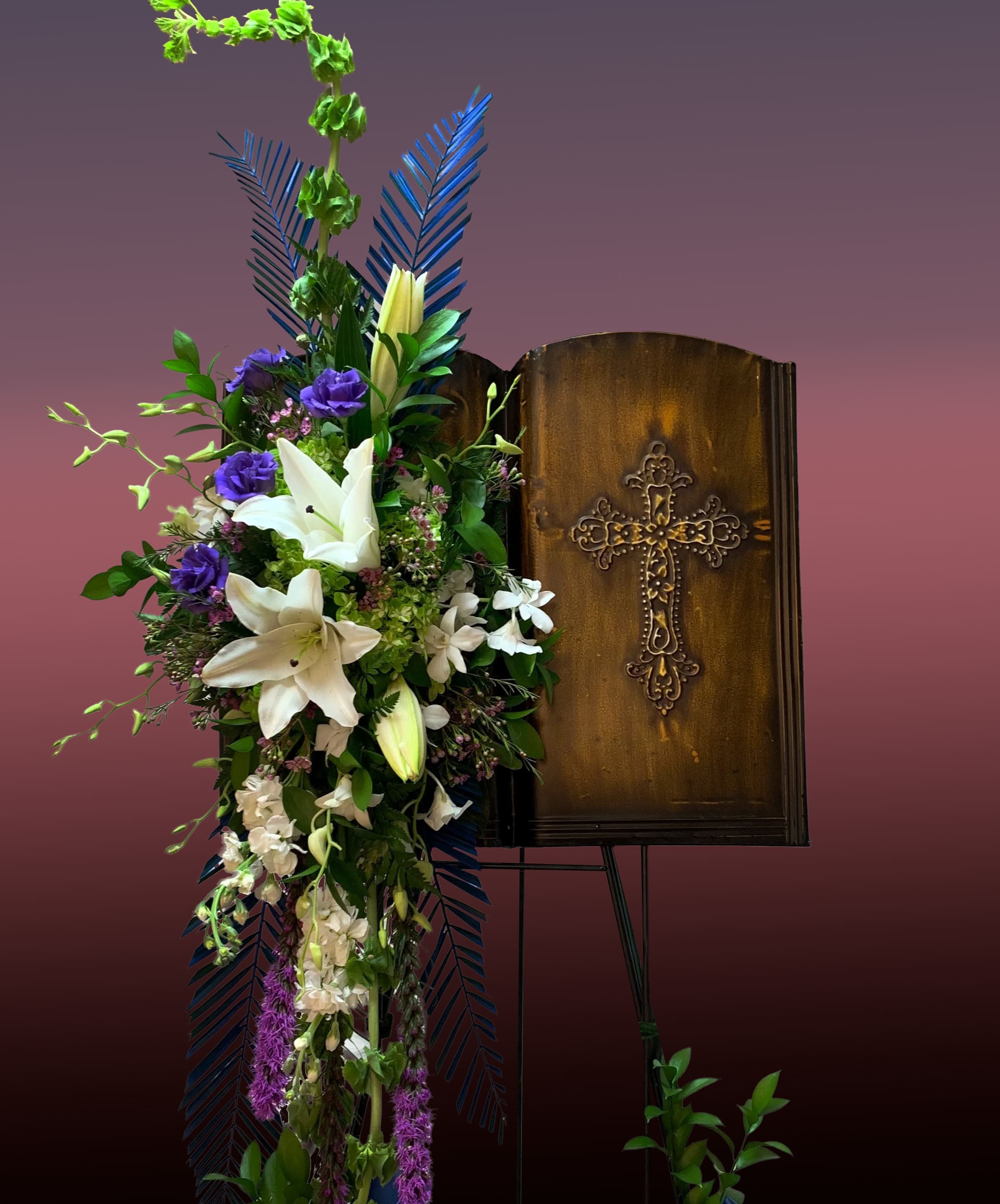 Bible Spray  - Metal Bible on stand that can be placed at graveside or yard in remembrance of your loved ones.  Choose any color flowers to have designed. 