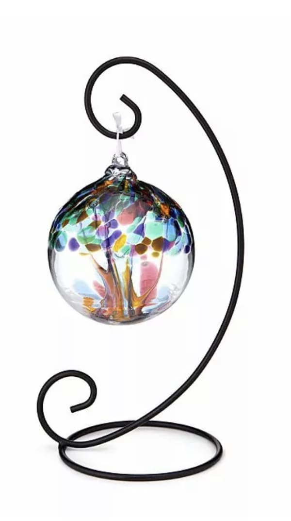 2in Glass Kitras Ball and Stand - Chose from the following themes:  tree of Summer, Life, Family, Kindness, Wonder, and Friendship.  Colors will vary based on theme