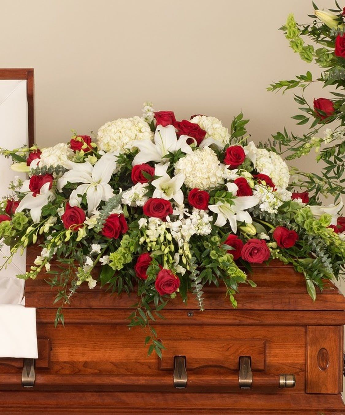 Forever Remembered - Simply stunning and sweet smelling, this exquisite spray brims with fresh flowers, showcasing nature's beauty and grace. This inspiring arrangement is a truly heartfelt and meaningful gesture of your deepest sympathy and fond remembrance.