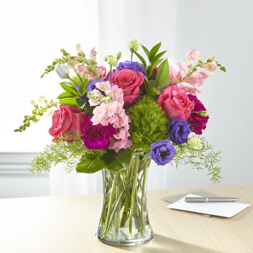 Charm &amp; Comfort Bouquet - Charm and comfort are evoked though a refined array of bright roses, lisianthus and snapdragons. 