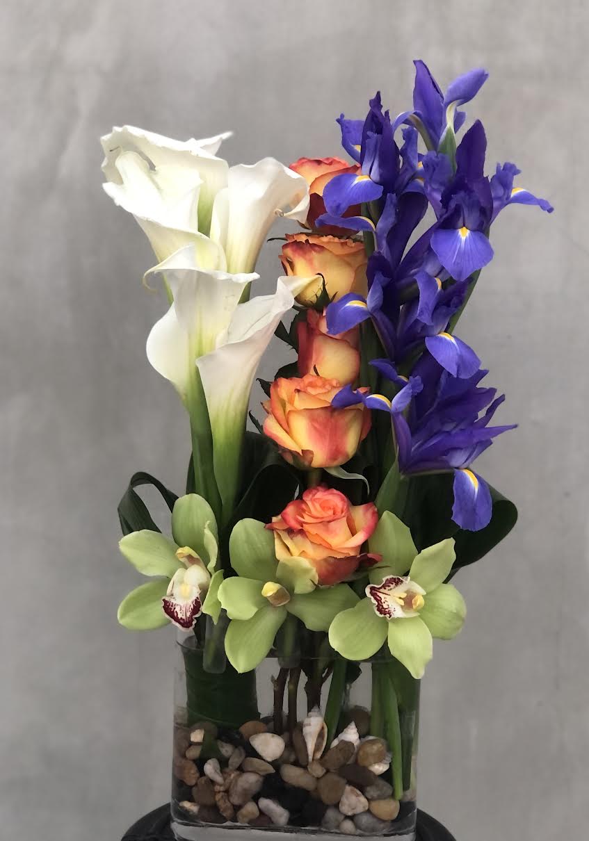 Love Forever Love Forever - Iris, Calla Lilly, Roses, Cymbidium Orchids in Glass vase.