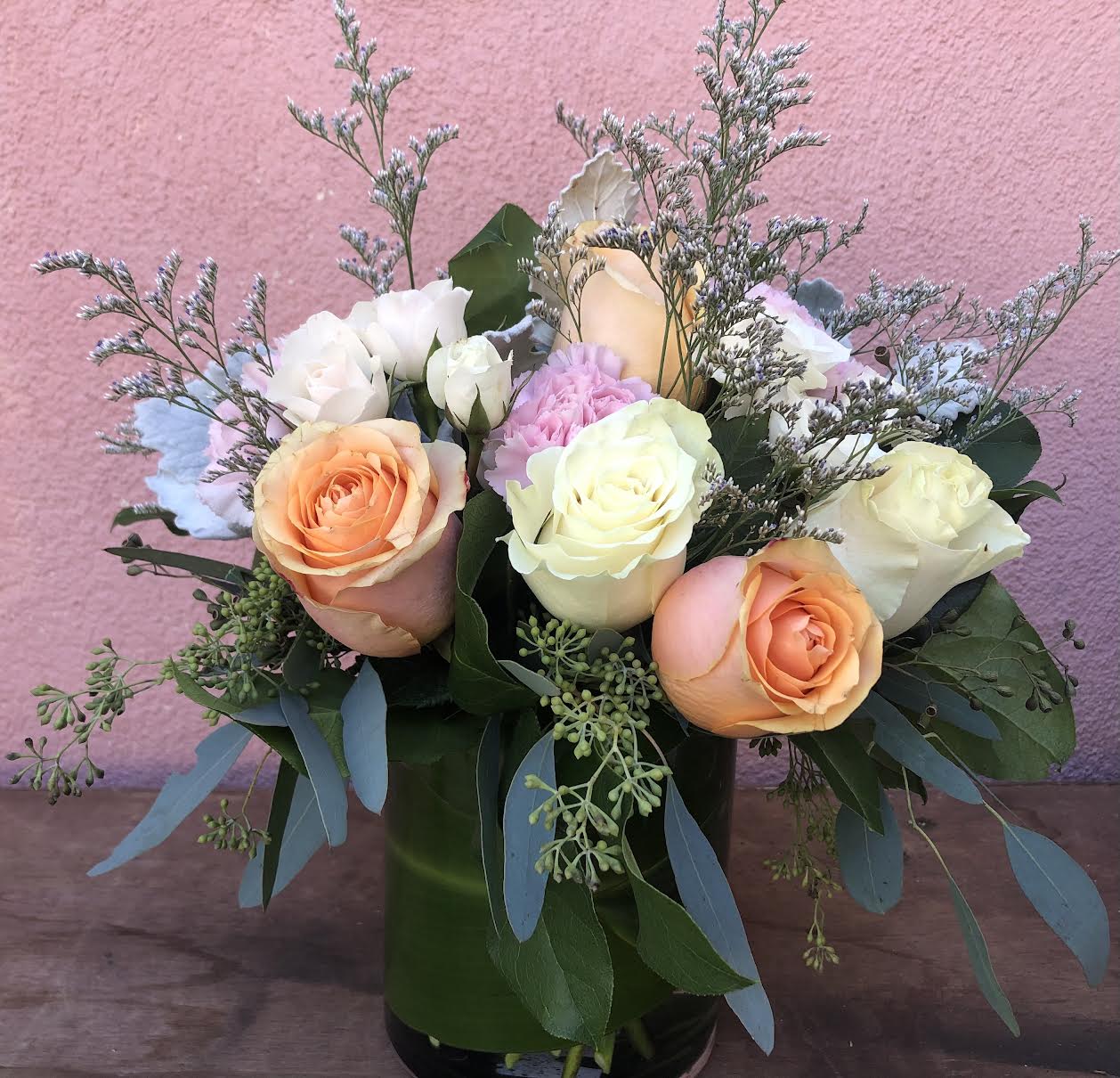Soft Color Roses Soft Color Roses - Roses, Lisianthus, Misty Blue. In Glass vase