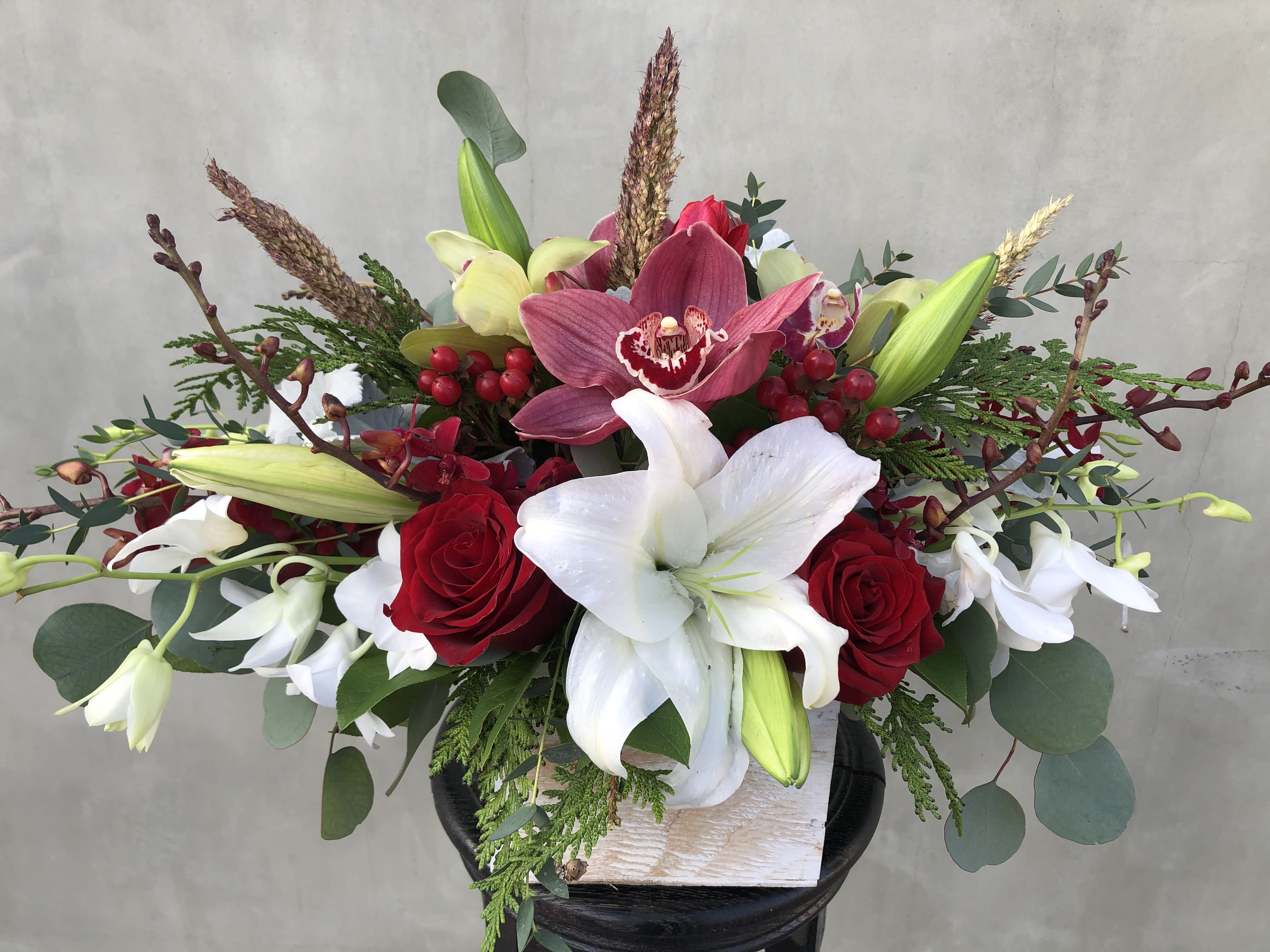 Smiles around Me Smiles around Me - Mix Orchids, Casablanca Lilies Ferns in wooden Box