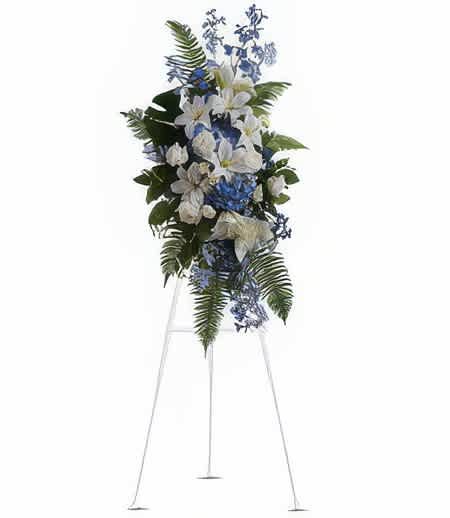 Adoringly Remembered Easel - Express loving honor and tribute to a most wonderful spirit with this breathtaking easel display overflowing with gorgeous flowers in tender remembrance  Number of flowers may vary depending on their size