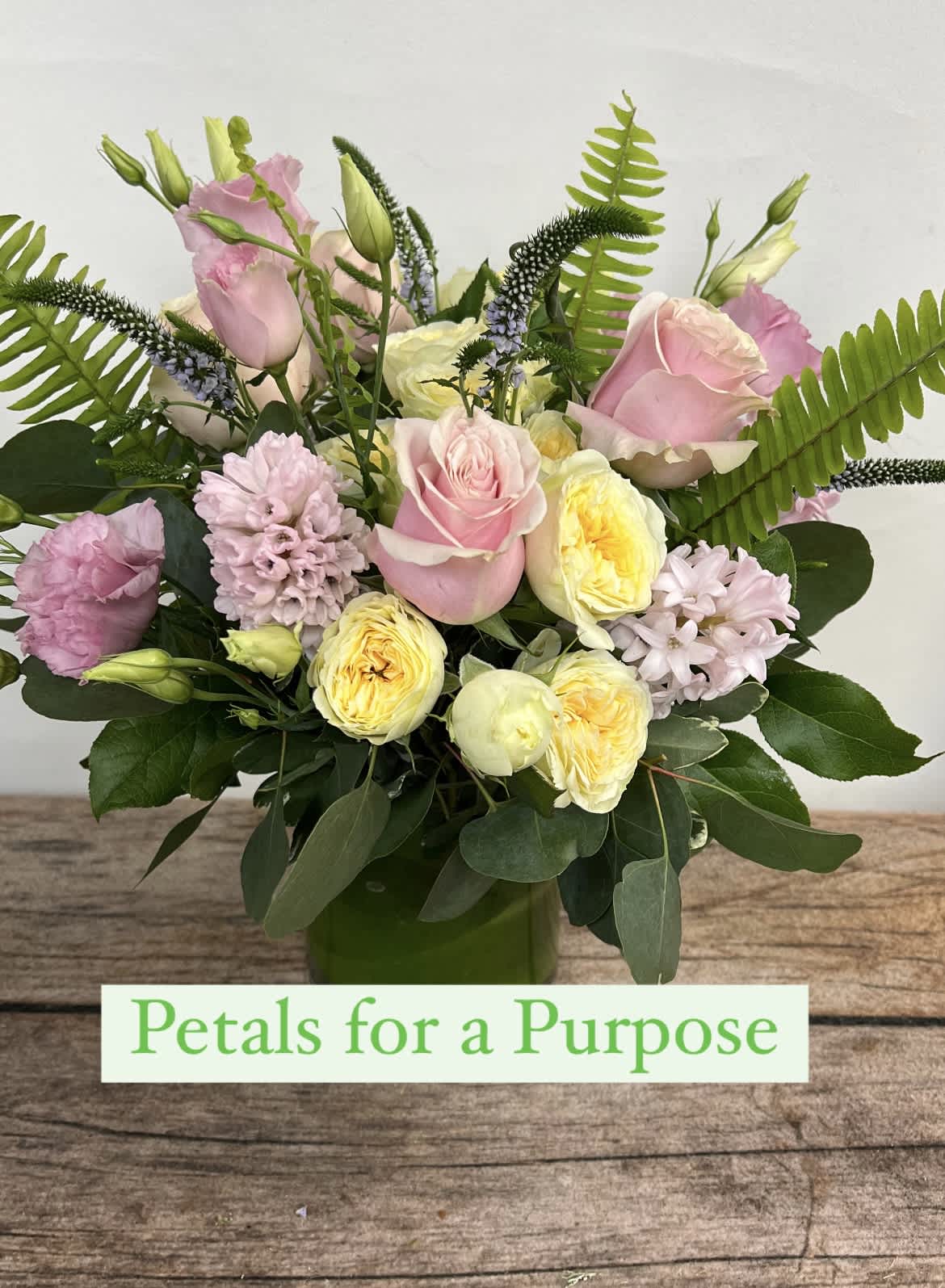 Petals for a Purpose - &quot;Hey Jude&quot; - April and May- St. Jude Children's Hospital. Each month, one of our designers chooses a charity near and dear to them. Proceeds from the sale of this arrangement will go towards this cause.  Patty created this pastel-toned arrangement of spring blooms to help support children and their families during their trying times. 