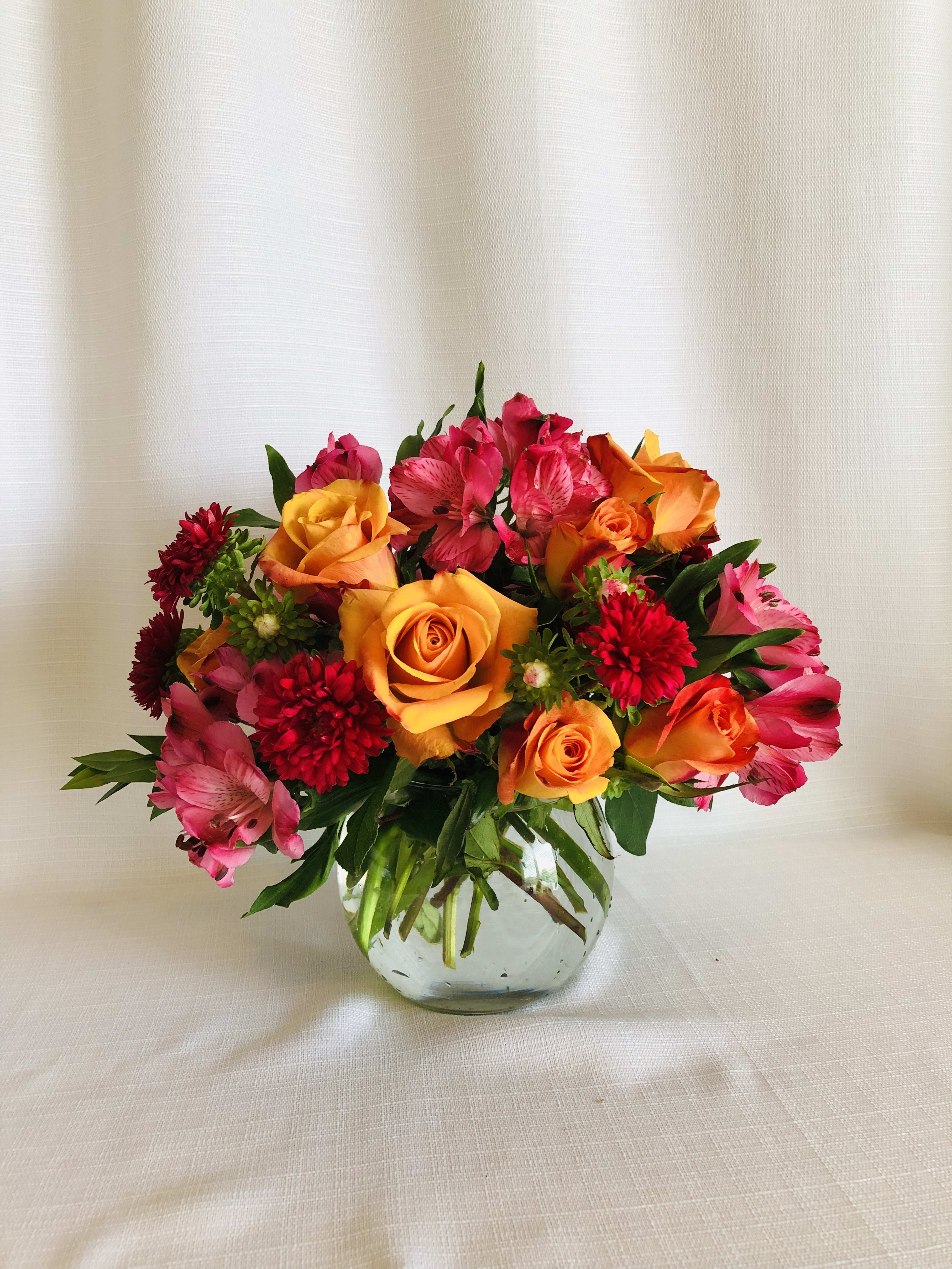 Orange Pop  - Orange roses with hot pink flowers 