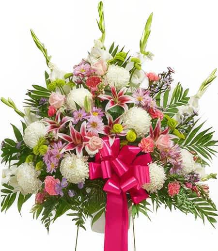 Bright Eternity - Extend your warmest sympathy and support with this stunning medley of vibrantly colorful flowers. What a heartfelt way to console a friend or loved one during this difficult time.  