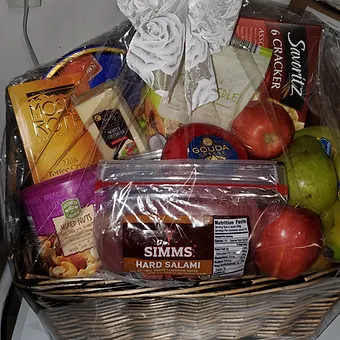 Fruit, cheese and treat basket LG - Our largest treat basket brimming with fruit, chocolates, nuts, cheese, crackers and lots of other treats, a wonderful gift, great for any occassion.