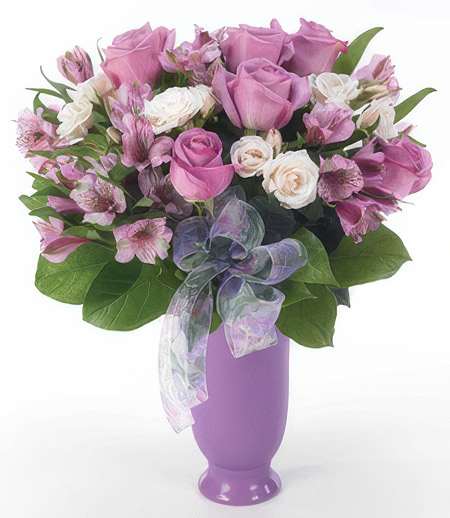 Lavish in Lavender - Wake up to the sweet smell of Lavish in Lavender for pastel blooms ignite a sense of delicate moments in the air. Precious sweet aromatic blooms make that special someone reminisce about their most cherished moments. Inspire that loved one to see a different side of life with a token of mere affection!  Add water daily to ensure your floral arrangement stays fresh and display the flowers in a cool location away from direct sunlight.