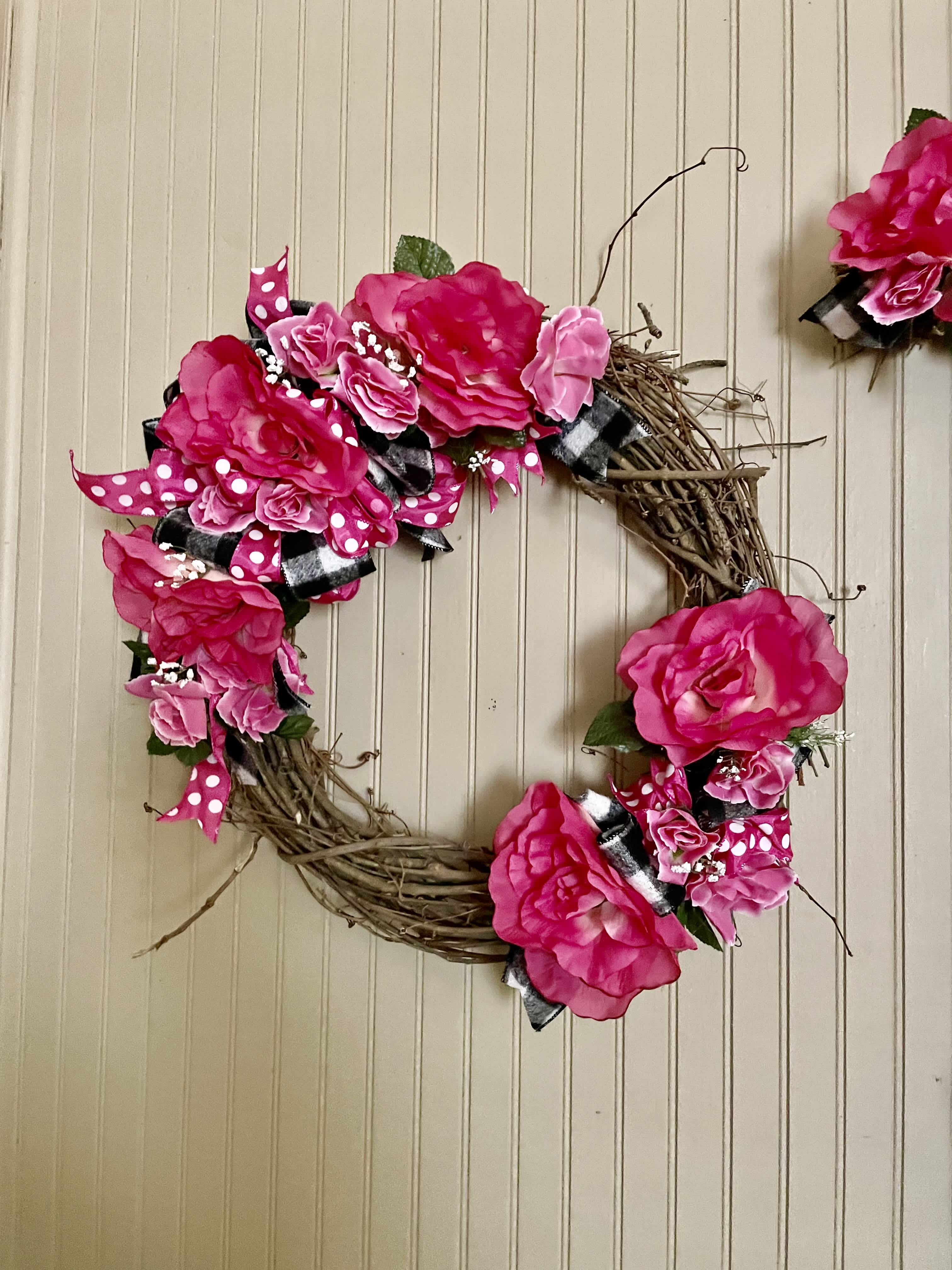 Pretty Pink and Plaid Silk Grapevine wreath  - Beautifully arranged roses in shades of pink and mixed greenery make this Grapevine Wreath an absolute beauty. Unique and lovely.