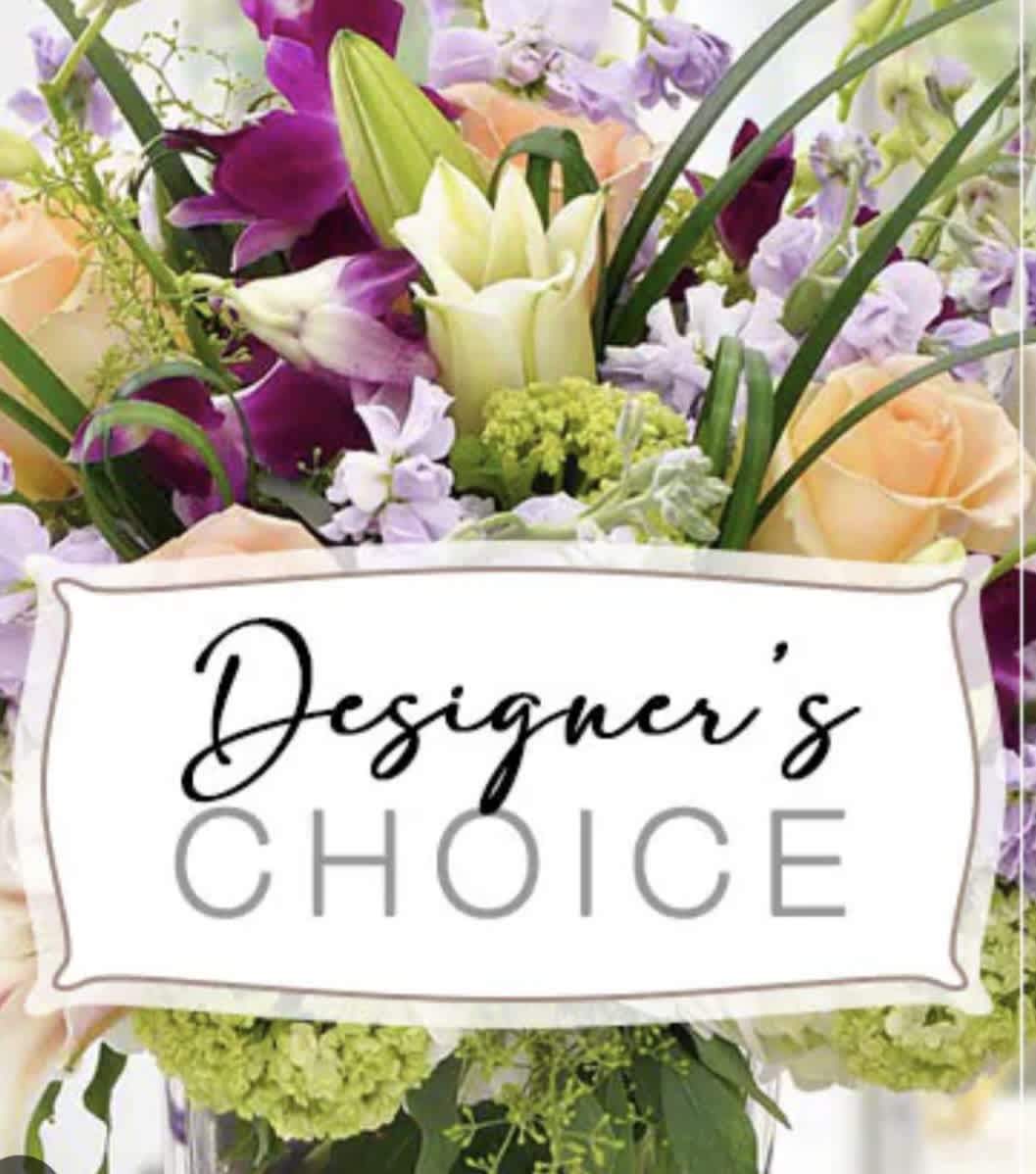 Spring seasonal  designer’s choice  - Vase filled with beautiful spring flowers. Perfect arrangement to start the spring season.