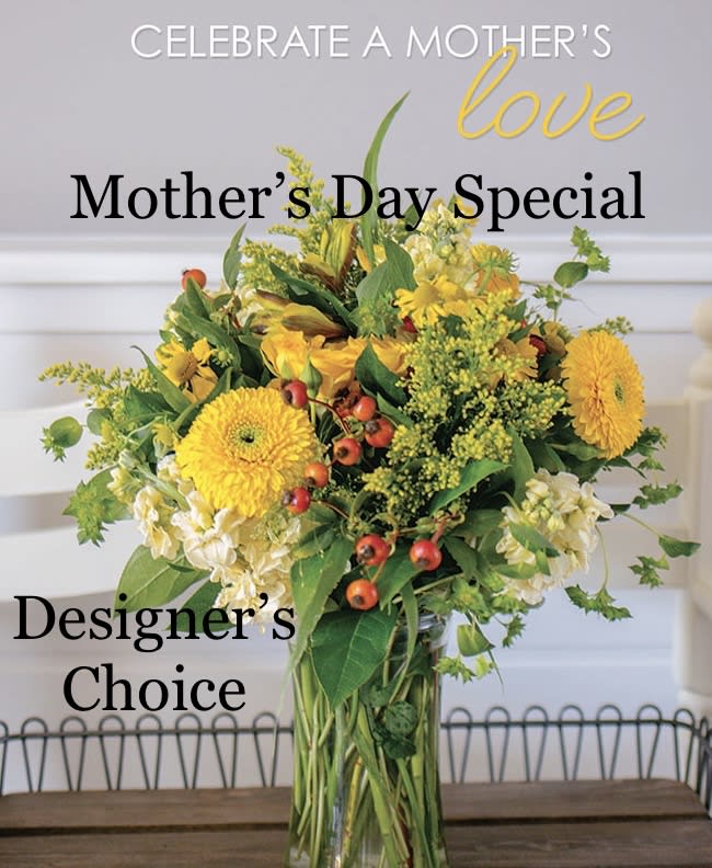 Mother’s day - Designer’s Choice*.  A Floral Archist ™ original. - Send a beautiful arrangement designed to brighten up Mom’s day! An array of seasonal blooms complementing each other to create a stunning piece worthy of admiration, love all devotion… just like Mom!  This is a Designer’s Choice arrangement. *Designer will choose color palette, container, florals and design.  NOTE: Picture for display only and is not design offered.  DESIGN: This design is available during Mothers Day’s open ordering period only (5/6-5/12/24’).   Our flowers and greens are a gift from nature. It’s shade, shape, size and depth might vary… design, aesthetic and value remains the same. In support of our efforts to aide in the preservation of our planet, PJf uses Fair Trade flowers, Plants, Organic (when possible), Upcycled or Recycled*containers.  Design: (Fresh florals, glass vase in water). Container may vary.  Dads are Moms too!  