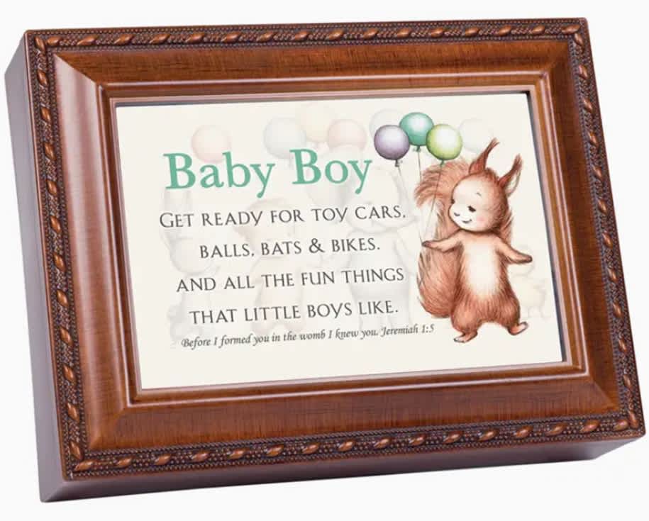 &quot;Baby Boy&quot; Music Box - Hinged lid designed with double window frame; embossed rope trim details. Jewelry box measures approximately 8 x 6 x 2.5 inches; Replace artwork with personal photo. Black velvet lined interior cushions your precious treasures; Decorative bun feet are padded to protect table top and shelf surfaces. Traditional wind-up mechanism engages music.  