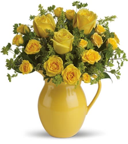 Teleflora's Sunny Day Pitcher of Roses - Want to make any day sunny for someone special? Simply have this cheerful pitcher of bright yellow roses hand-delivered to them and they will bask in its warm glow. Just think: No SPF needed! Brilliant yellow roses and spray roses are arranged in a delightful mix that's delivered in a keepsake yellow pitcher they can use again and again. What a heartwarming gift! Approximately 13 1/2&quot; W x 14 1/2&quot; H Orientation: All-Around As Shown : T71-1A Deluxe : T71-1B Premium : T71-1C