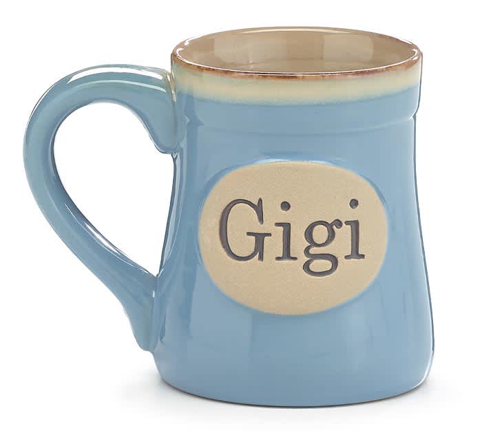 Gigi Mug - Dishwasher safe/FDA approved/Microwave safe. Hand-painted blue porcelain mug with a slight taupe rim. In the center of the mug, raised &quot;Gigi&quot; message in a taupe circle. Interior is taupe and handle is blue.  4.75&quot;H x 3&quot;Opening. Capacity: 18 oz.