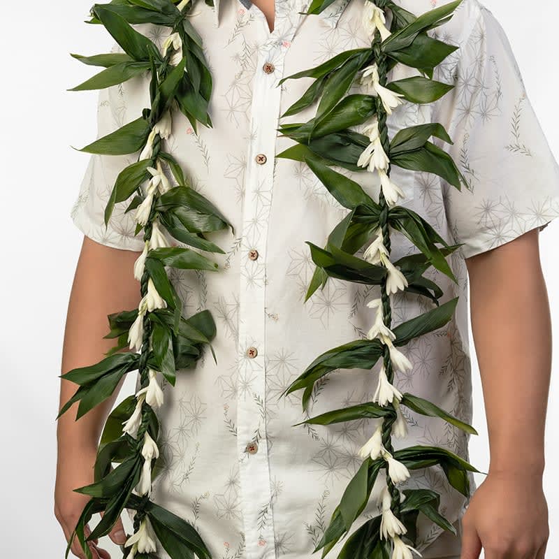Hawaiian Double Ti Leaf Maile Lei with Tuberose (Pick up Only) - Locally grown Ti leaf, shaped in the form of our traditional Maile Lei twined with locally grown tuberose.  Perfect for Prom, Weddings and special events. Not as full as a traditional Maile lei, but great cost alternative.