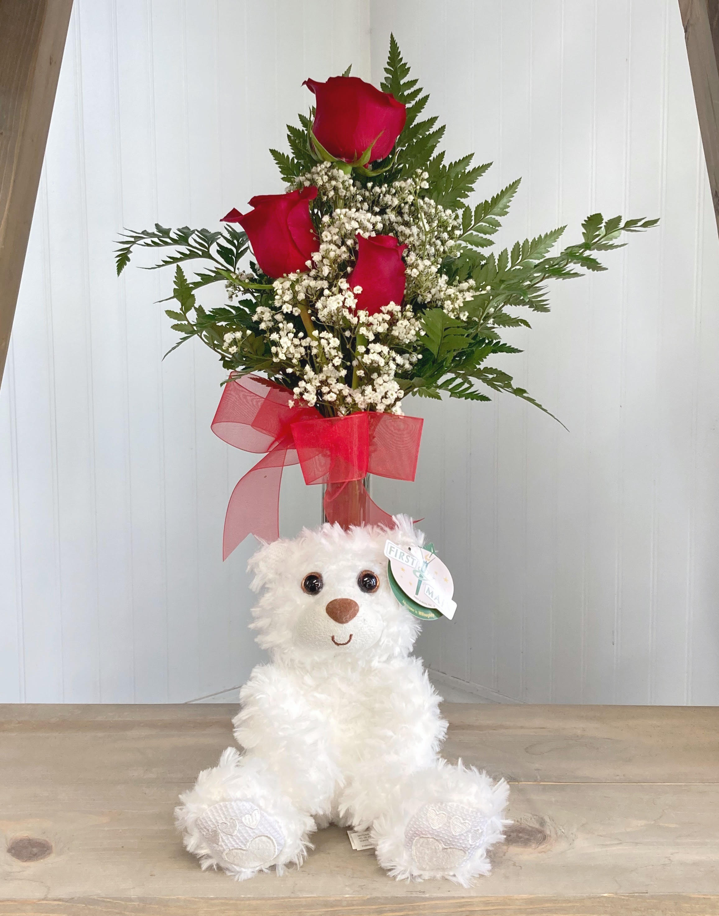 Bear &amp; Bud Vase  - A clear bud vase that holds three bright rose blooms. If you would like a different color rose than pictured, indicate the color in special instructions. This arrangement comes with a cute, little teddy bear.