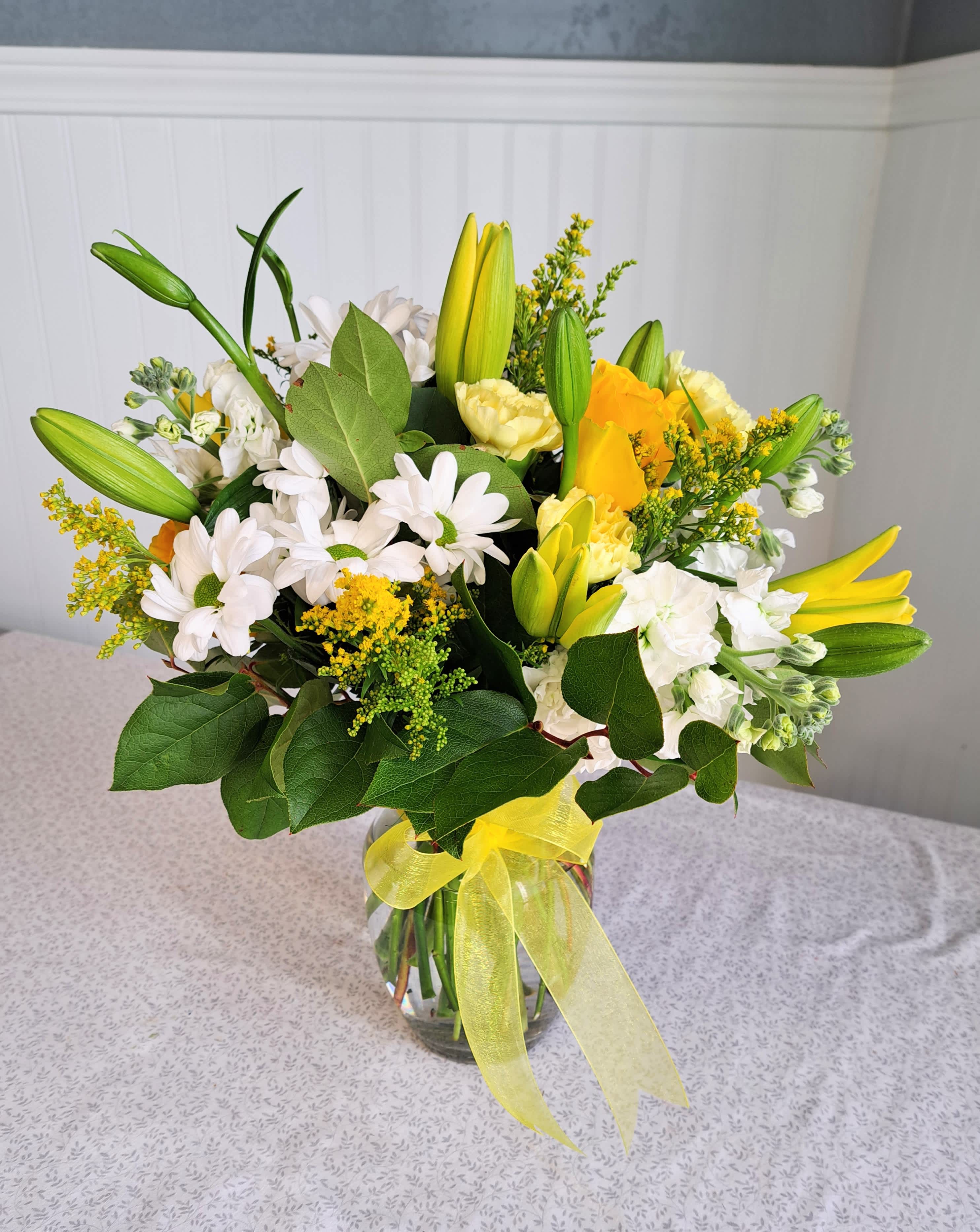 Lemonade Posy - Today is about showing someone you love and care, and how happy they make you! Tell your loved one you love them with this Lemonade Posy bouquet filled with bright and cheerful blooms that symbolize love, happiness, positivity, and loyalty.