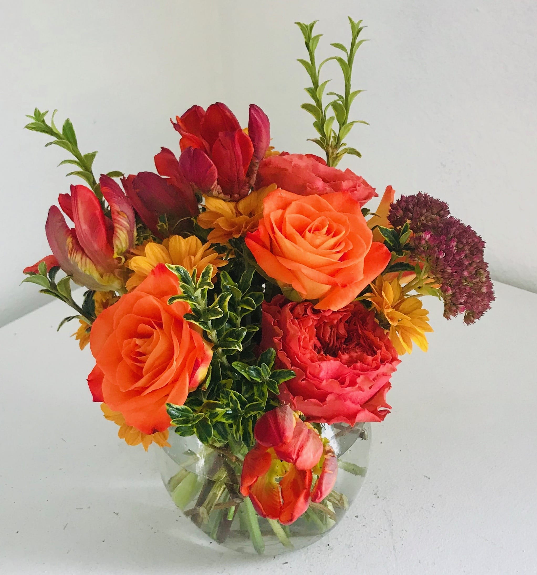 Bowl of Beauty - Intense colors of roses and other premium flowers