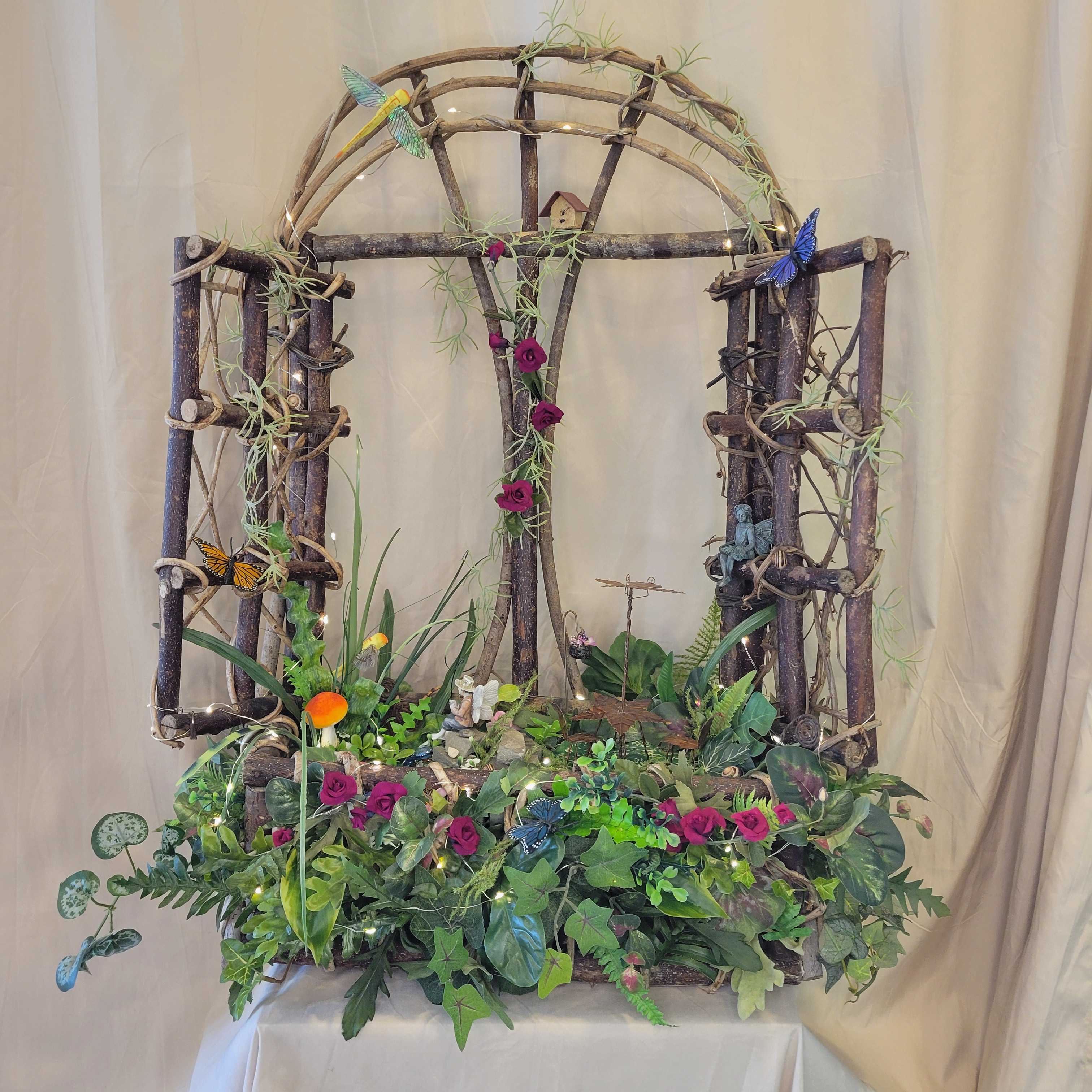 Window into Fairyland by Rene - Absolutely a window into fairyland!  Fairies of course, dragon flies, butterflies, birdhouse a pond to fish in, table and chairs to relax...  Fairylights all around the windowbox with hanger for a wall or can sit on a table. (28&quot; high x 29&quot; long x 7&quot; wide)