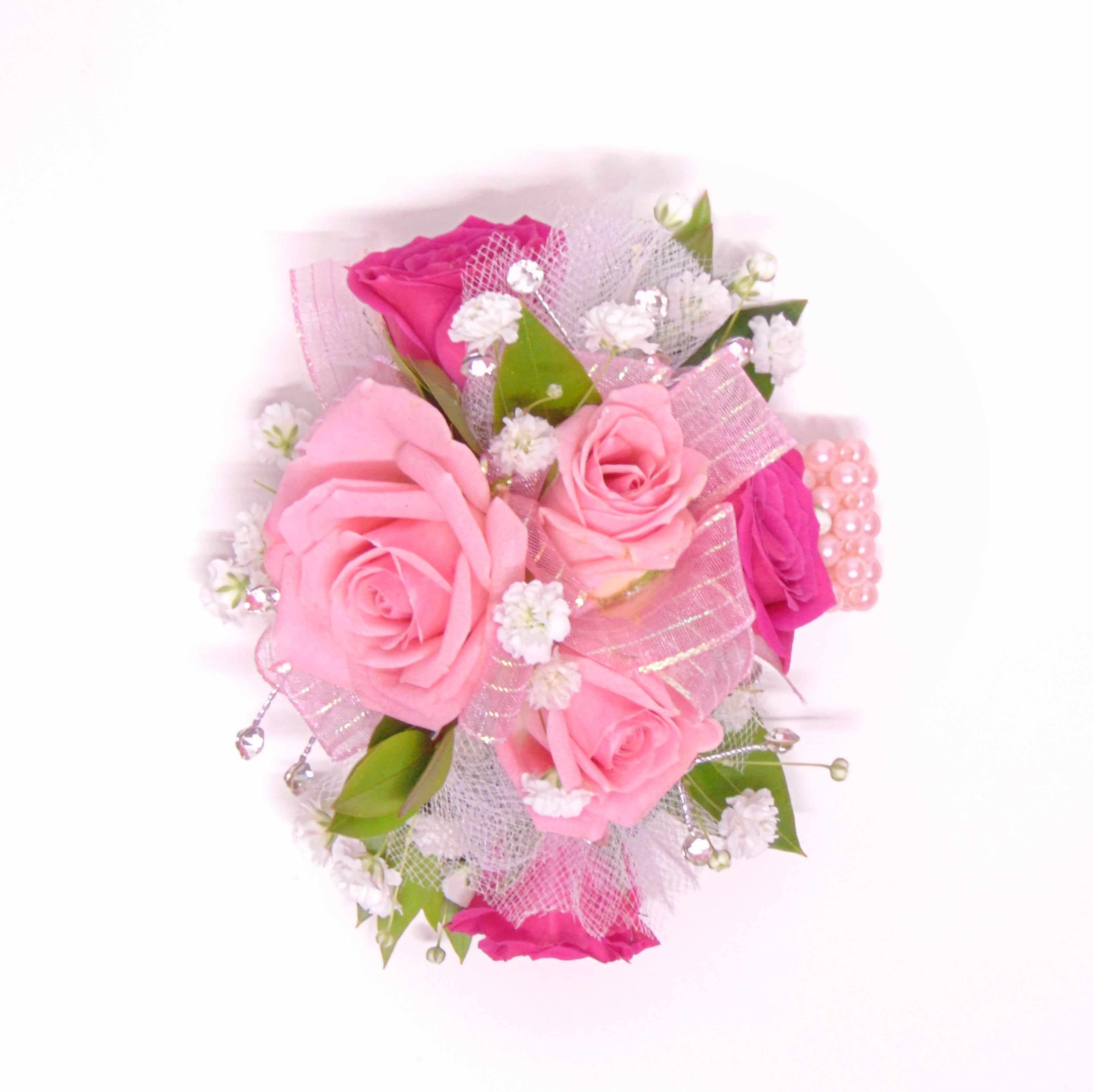 Pink &amp; Hot Pink Wrist Corsage-Bling - Three pink  spray roses &amp; three hot pink spray roses, baby's breath, pink &amp; iridescent ribbon, rhinestone bling, light pink tulle and myrtle greens on a pink beaded wristlet. Includes corsage box.