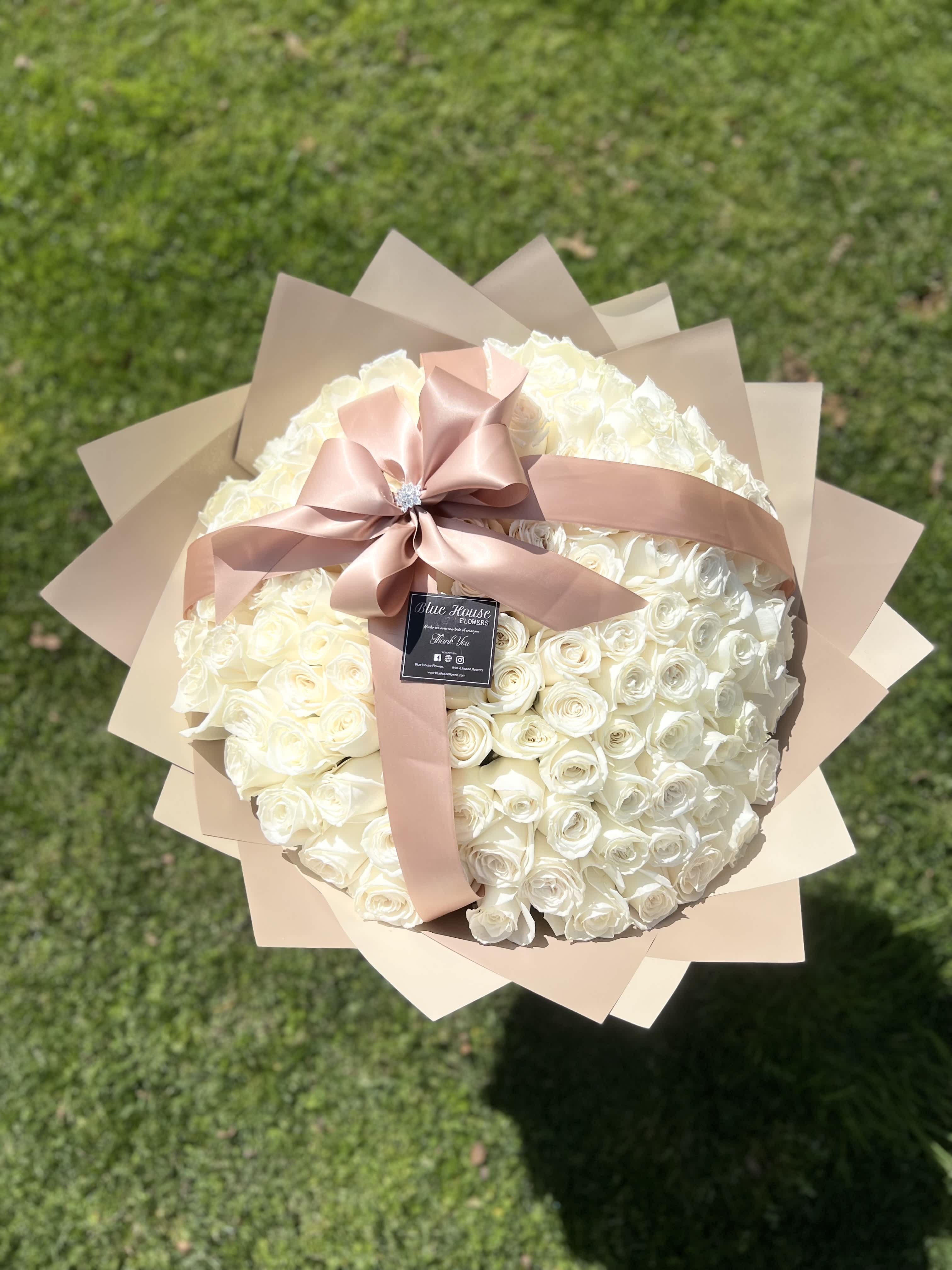 White Coquette Bouquet - 100 Long White Roses Wrapped Champagne.