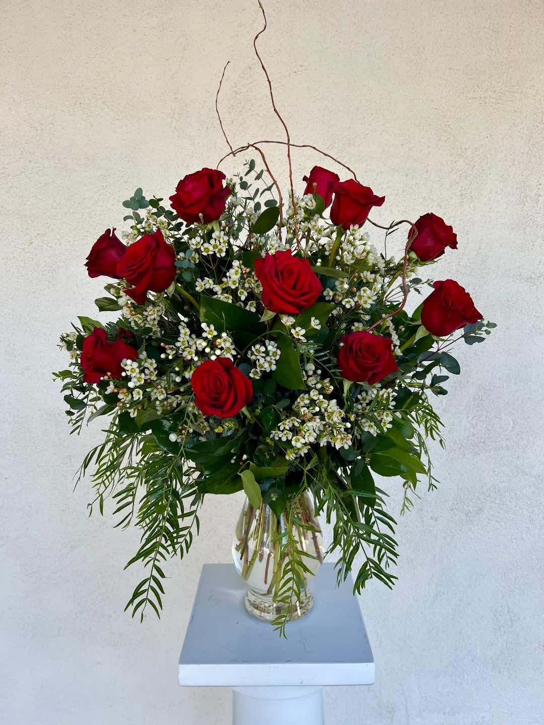 LF23 - 1, 2 or 3 Dozen Red Roses - 12, 24 or 36 Premium Red Roses in a glass vase, with greenery and pretty filler flowers.