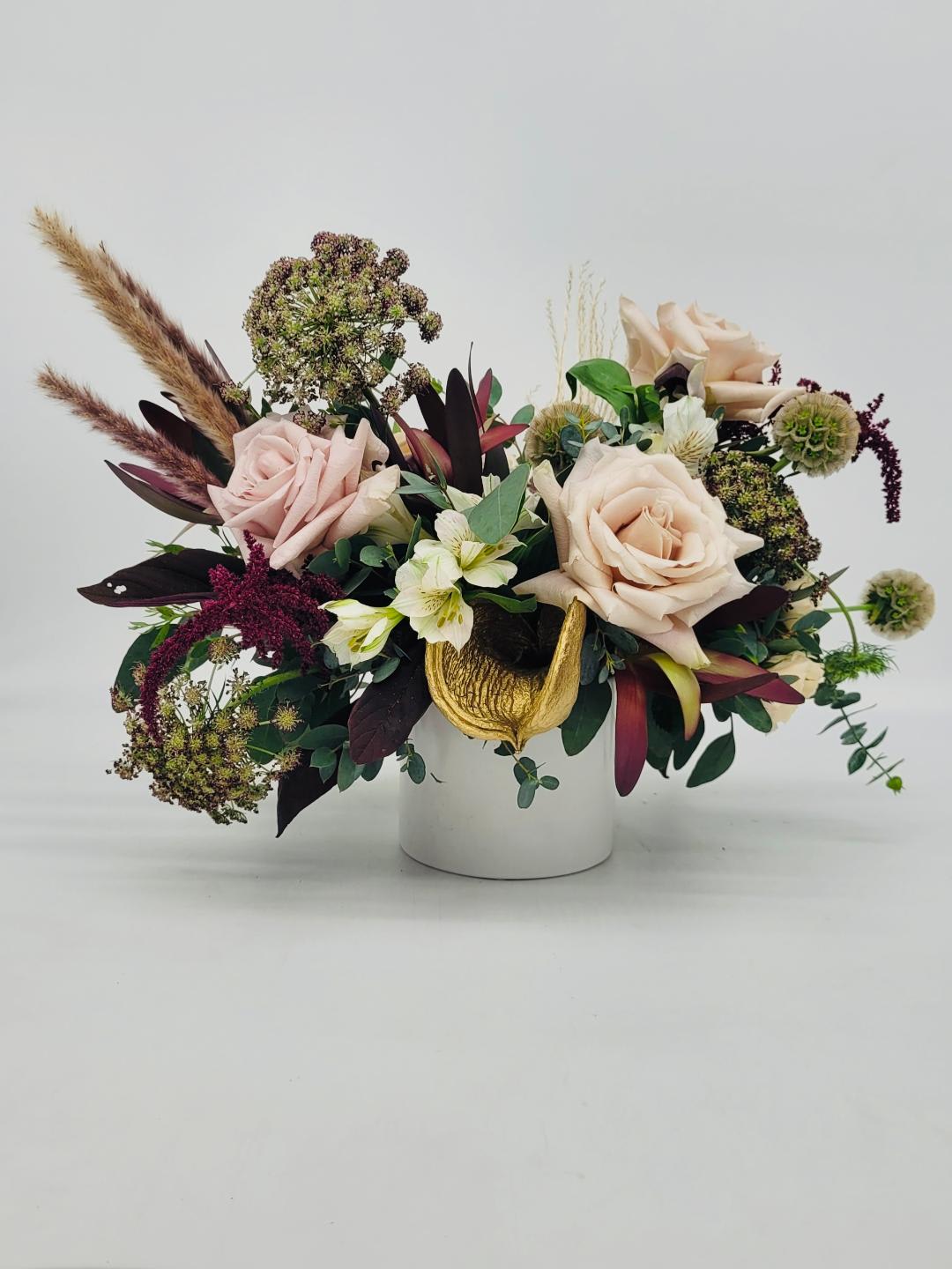 LF 398 Forever Elegant - This arrangement embodies the essence of the season flawlessly.  Forever Elegant is a perfect exhibit of fall vibrancy, along with expressing love and gratitude for that special someone.    The bouquet features striking Amaranthus, Safari Sunset, Chocolate Lace, Roses, Scabiosa Pods, Alstroemeria, and Seasonal Fall elements.    Approx. Dimensions:  14&quot;H  X 12&quot;W   Orientation:  All Around