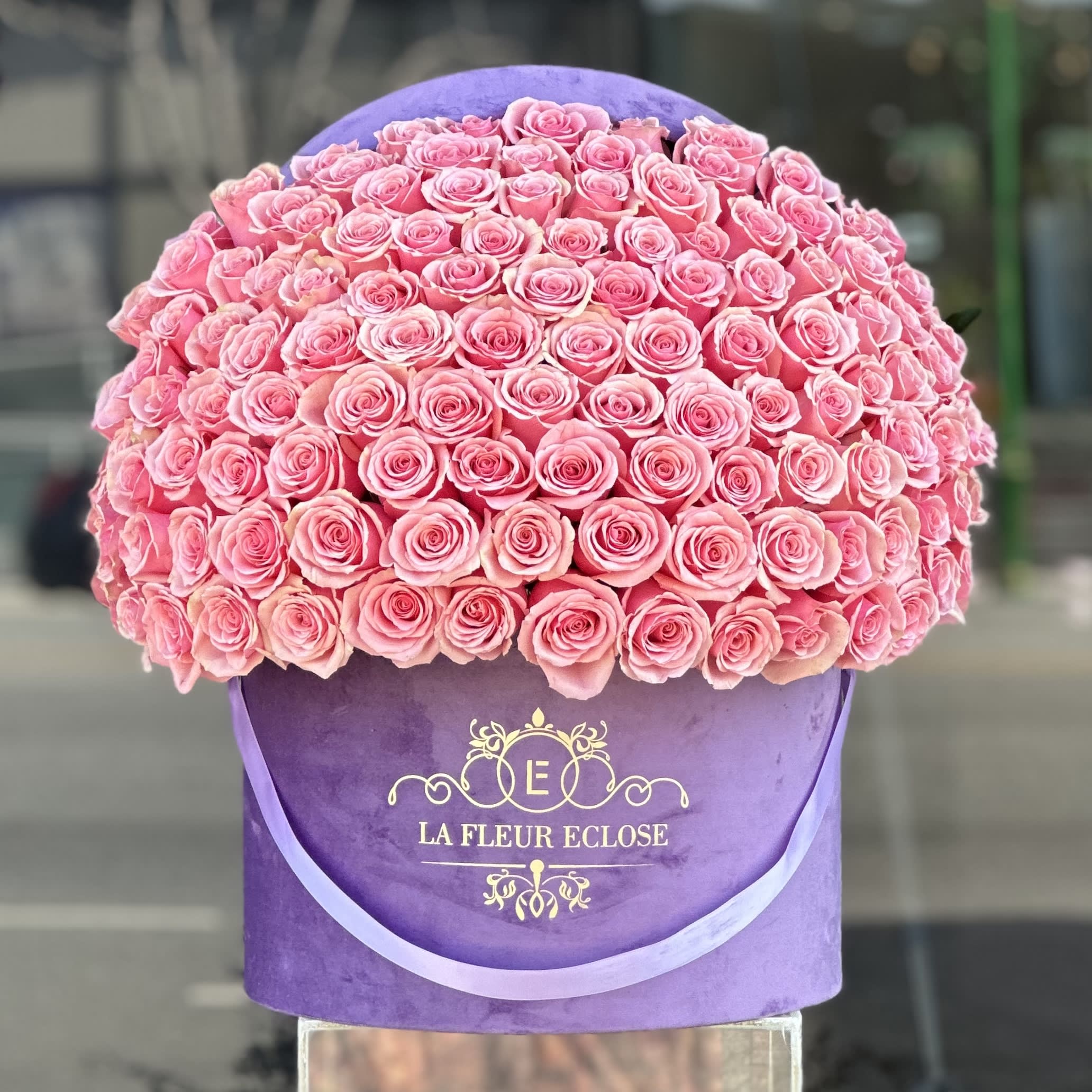 Lavender Pink V  - 125 fresh pink roses in a Signature lavender box