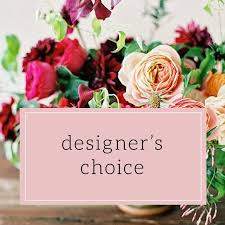 $95 Designer's Choice Arrangement - We will create something lovely, using the best and highest quality stems available, pairing the arrangement with a vase to compliment the selection of flowers.