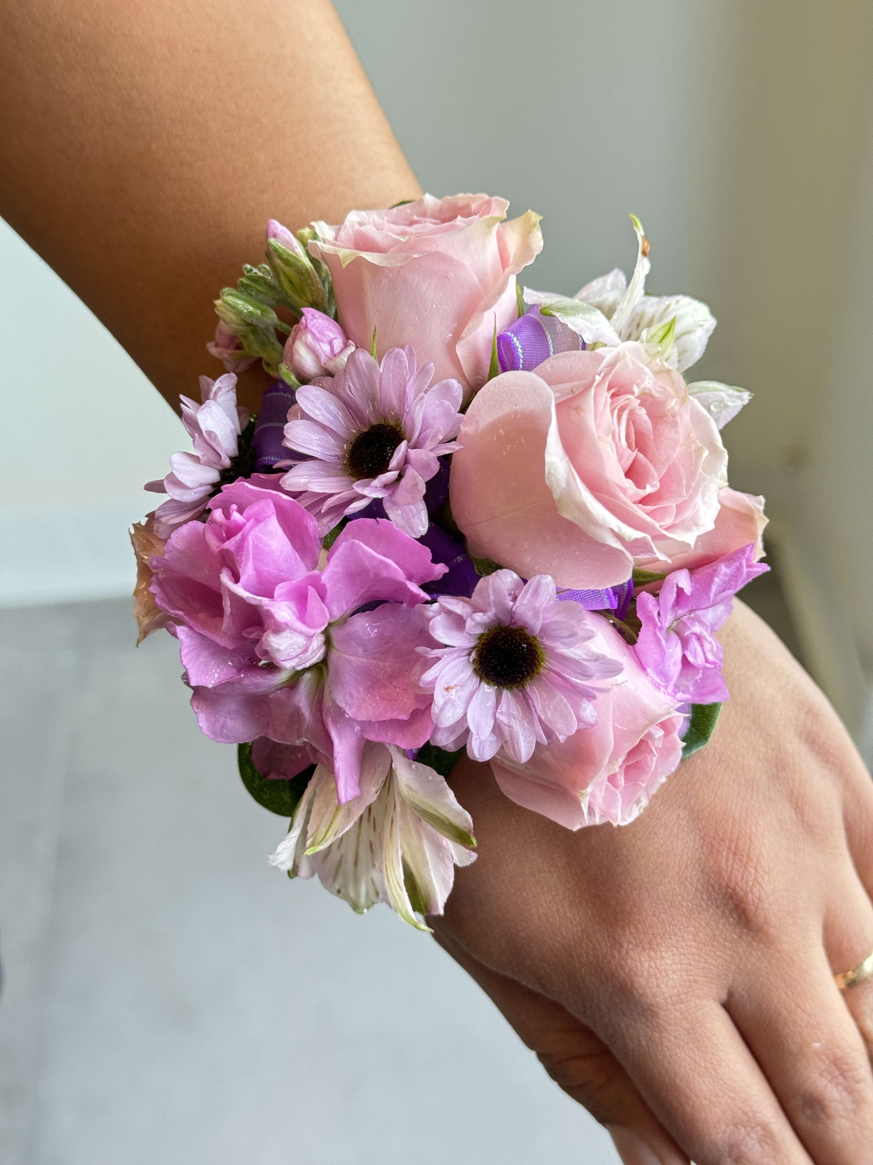 Corsage - You may specify color ribbon in notes.  If you would like a custom design please call in to discuss colors and pricing. 