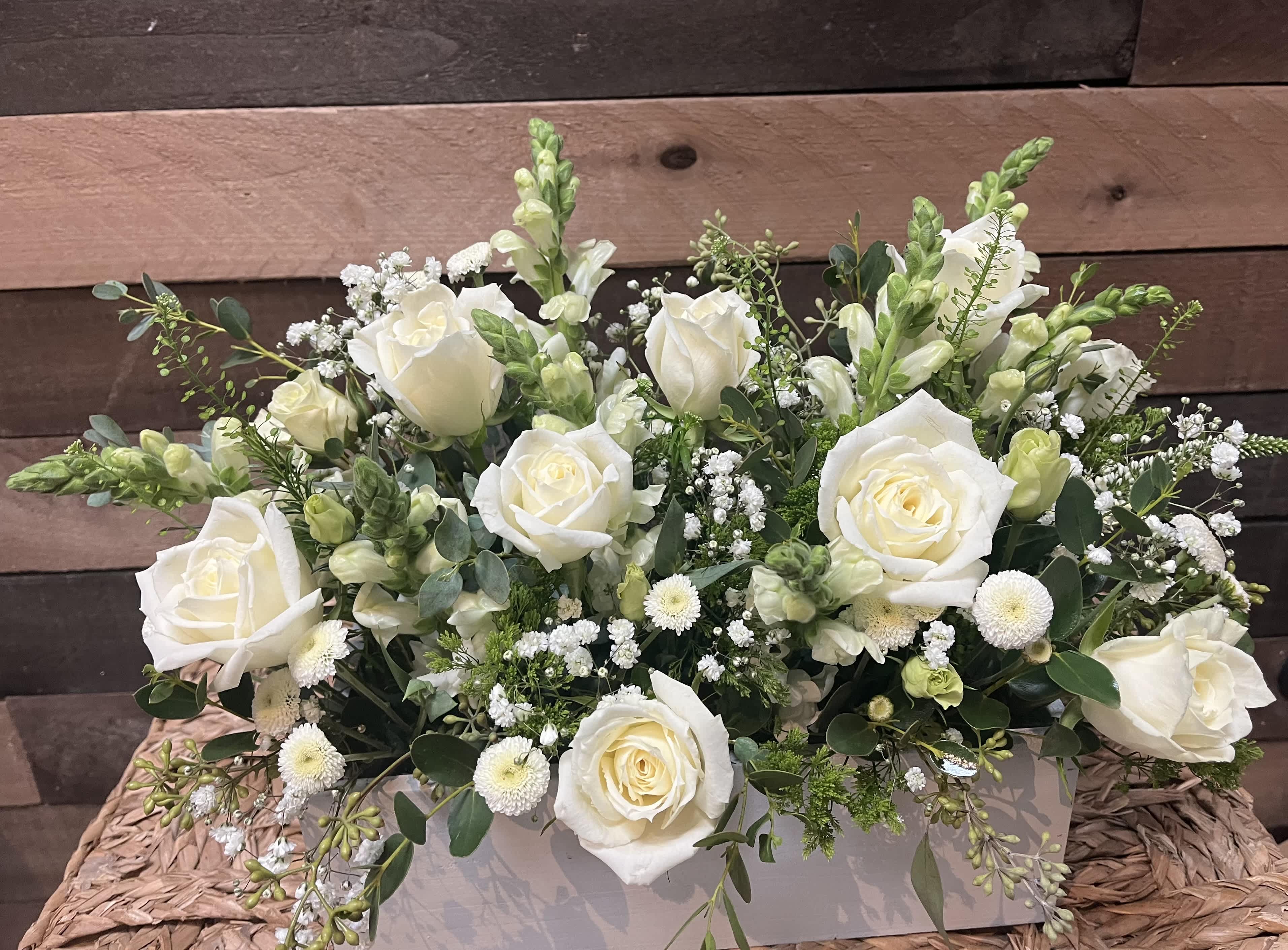 Elegant Mix - White roses, baby's breath, and stock accented with greenery and eucalyptus, adaptable to any occasion with customizable colors.