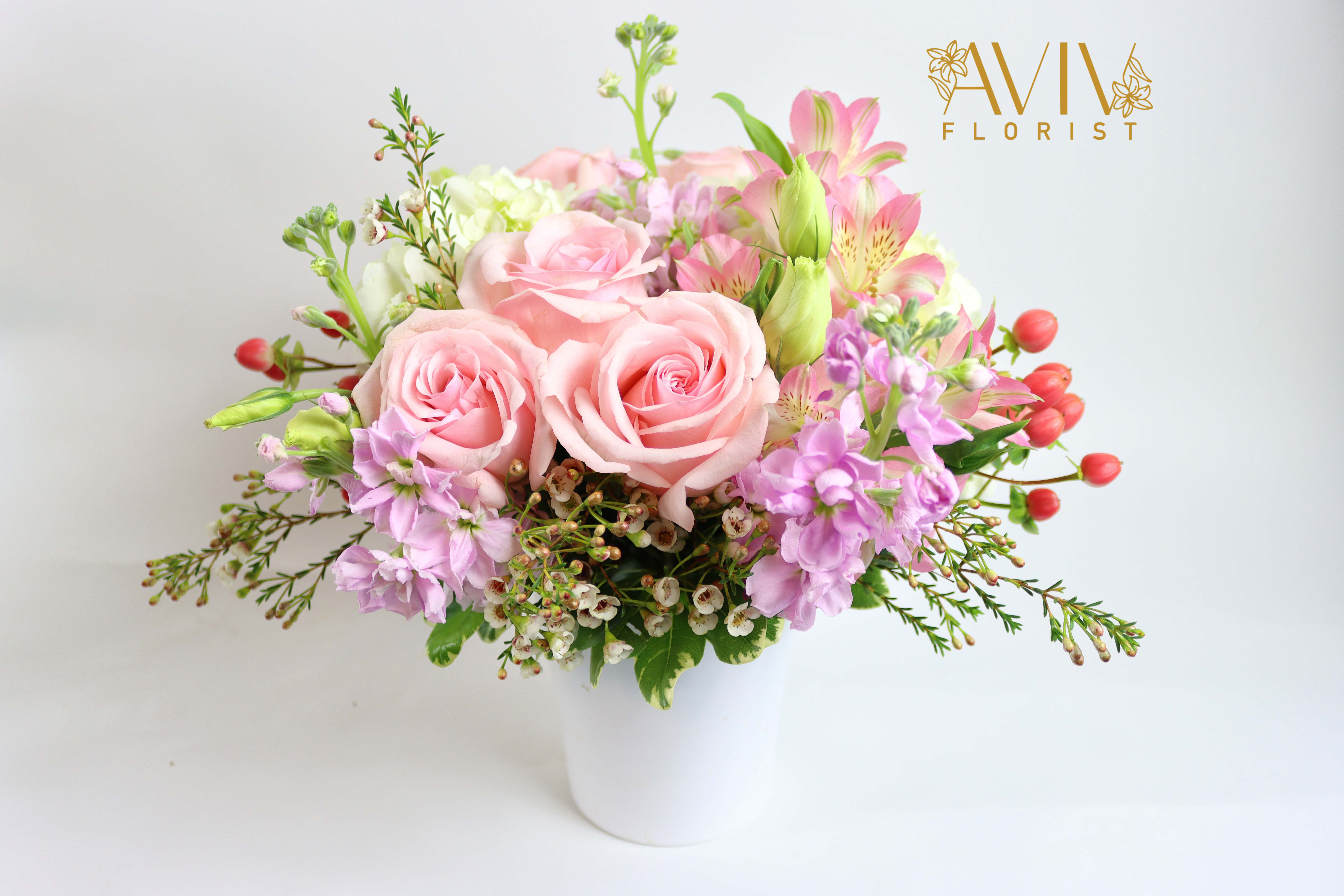 Sweet Moments  - This pretty arrangement classically elegant in a way that will never go out of style, this fresh flower arrangement is truly a dream.