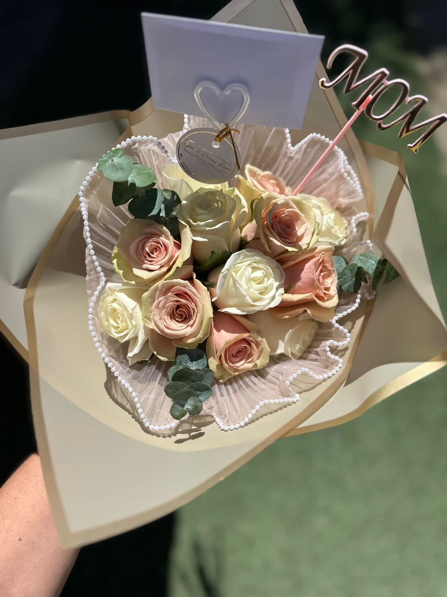 Wrapped bouquet for her - Wrapped Bouquet roses and a little touch of eucalyptus 