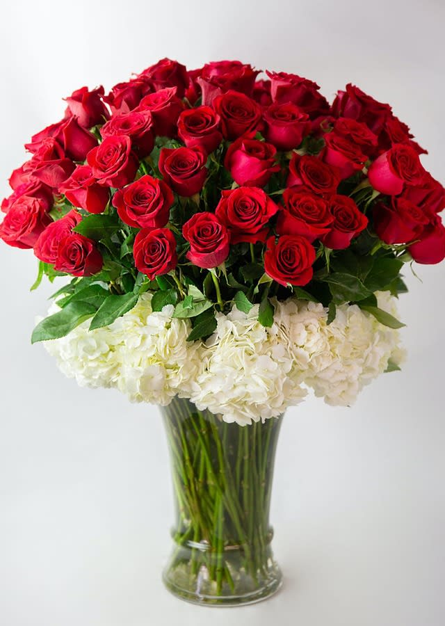 &quot;Red Statement&quot; Be Mine - Ask her to be your Valentine with this gorgeous LUXURIOUS PREMIUM LONG STEM RED ROSES arrangement! Starting 36 vibrant red roses with adorning white hydrangeas around will make her happily smile.  The quintessential symbol of enduring passion, RED ROSES! What better way to show your love?
