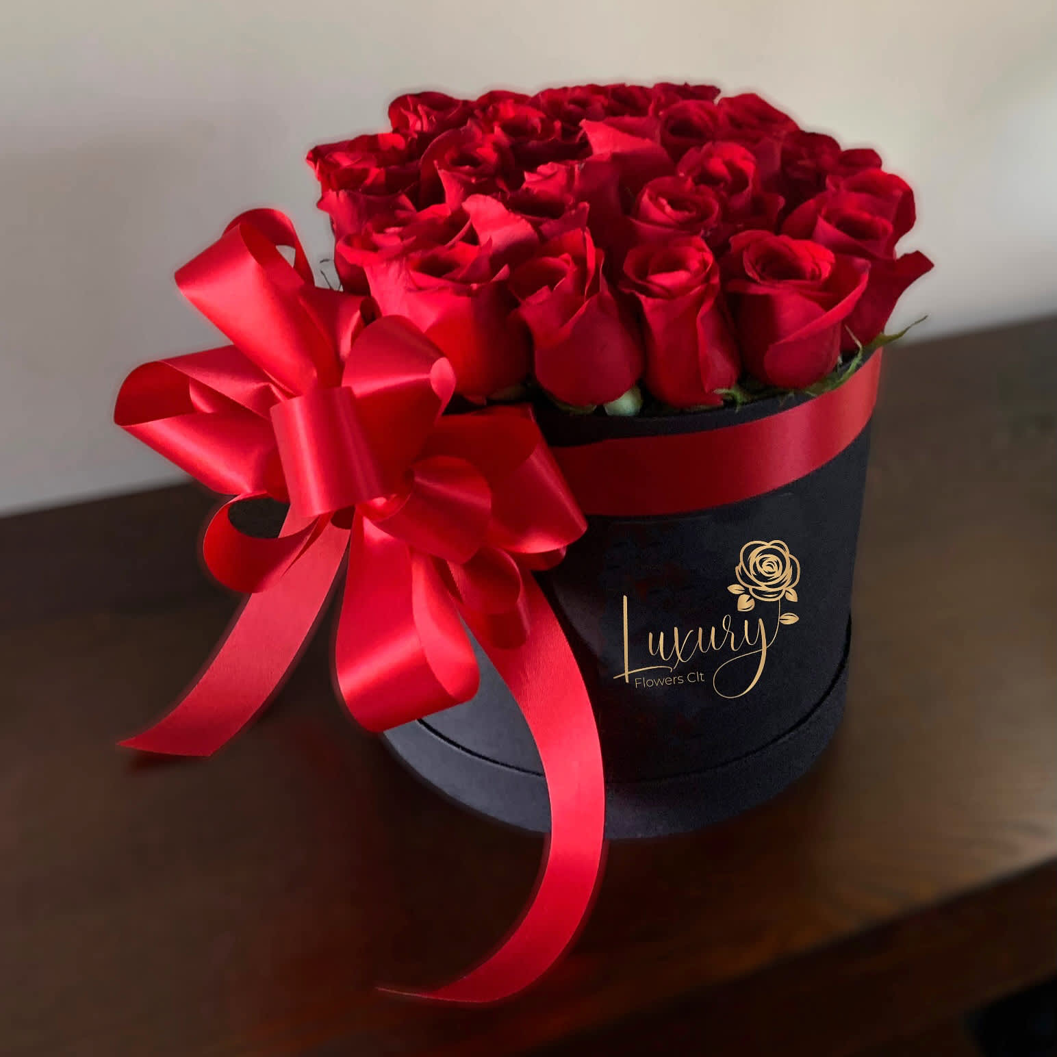 Everything I Need - Red - Our designs in beautiful round boxes are a true symbol of elegance. Whether you’re looking to impress your special person, show love to someone significant, or send a unique floral arrangement just because. •	Roses in Box: 30-35 stems of natural roses. Color Box: White or Black (subject to inventory availability) •	All Occasion •	Place your Order Online Monday to Saturday before 1:00 p.m. (E.T.) for same-day delivery.  •	“Orders received after hours will be delivered the next business day”. •	Check our coverage area. •	Occasionally, substitutions of flowers and/or containers happen due to weather, seasonality, and market conditions which may affect availability. If this is the case with the gift you’ve selected, we will ensure that the style, theme, and color scheme of your arrangement are preserved and will only substitute items of equal value or higher value.  CARE INSTRUCTIONS Gently mist the arrangement with natural water every other day. Do not spray any cleaning product on the flower arrangement. Do not place heavy objects directly on the flower arrangement. Keep them out of direct sunlight and extreme heat. 
