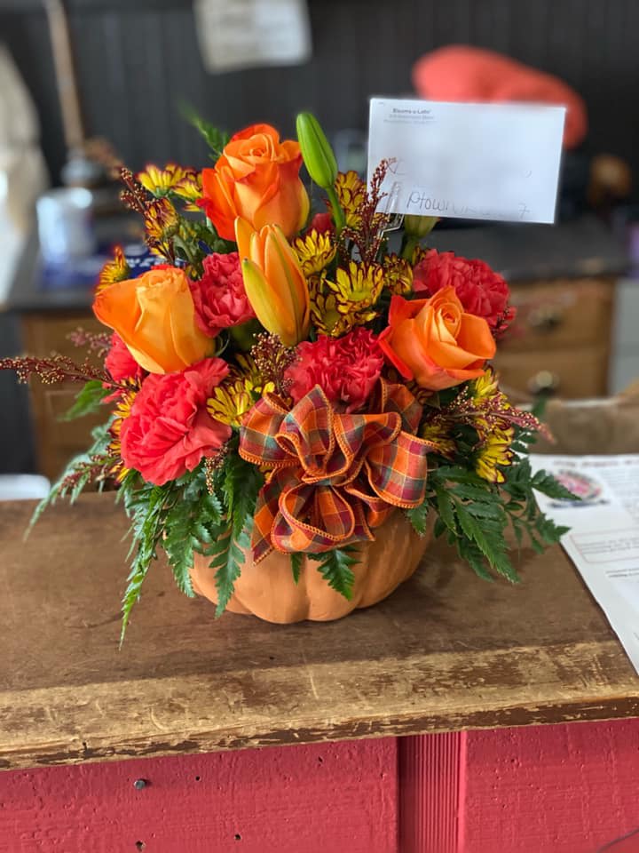 Perfect Pumpkin Bouquet Perfect Pumpkin Bouquet - A variety of fall colored flowers arranged in a ceramic pumpkin.