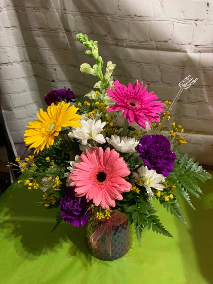 Brighten Your Day Bouquet Brighten Your Day Bouquet - A colorful bouquet with a variety of flowers arranged in a designer vase.