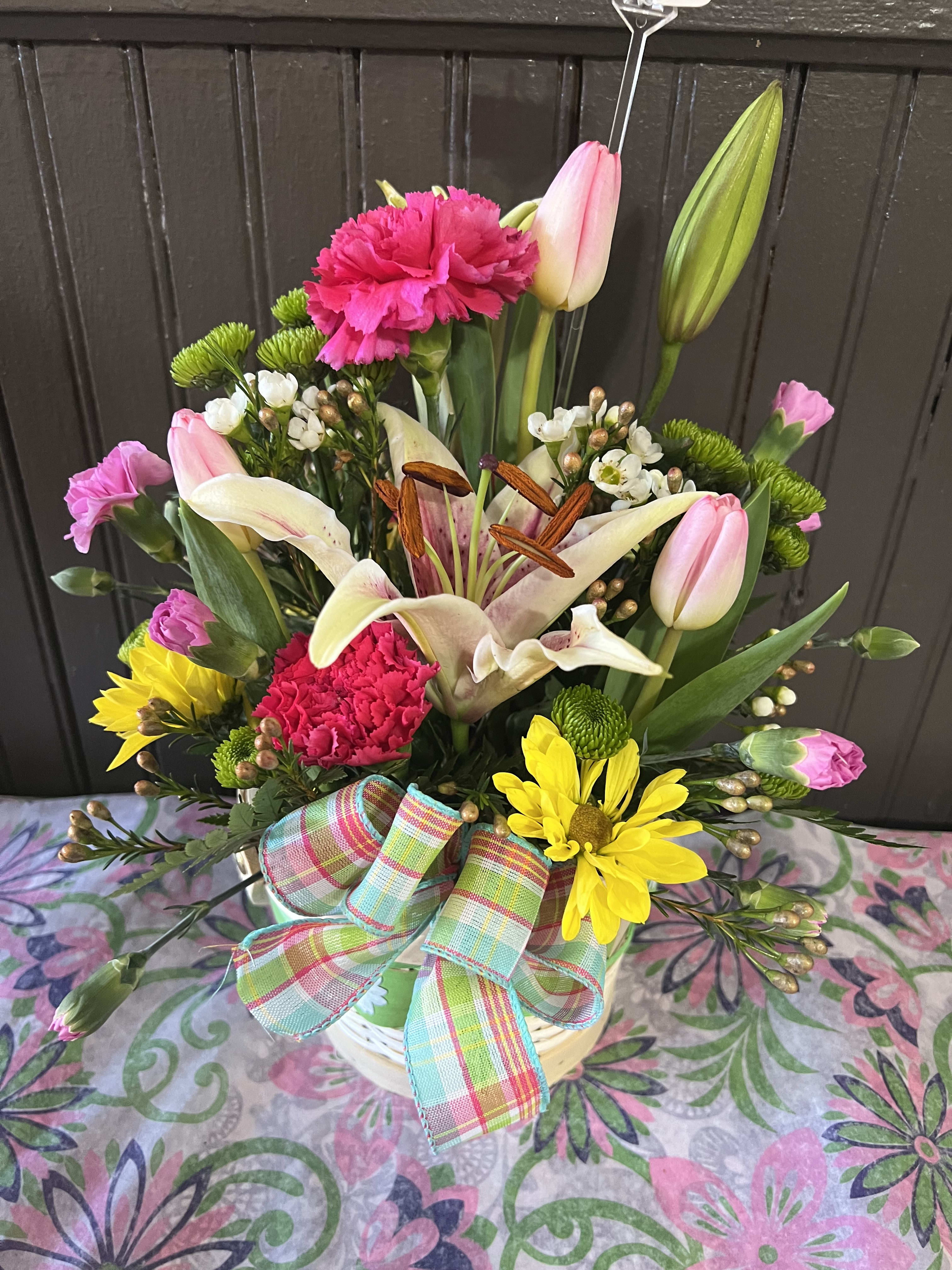 Spring Cheer Bouquet Spring Cheer Bouquet - An arrangement of pink and yellow featuring Tulips, Lilies, and Carnations