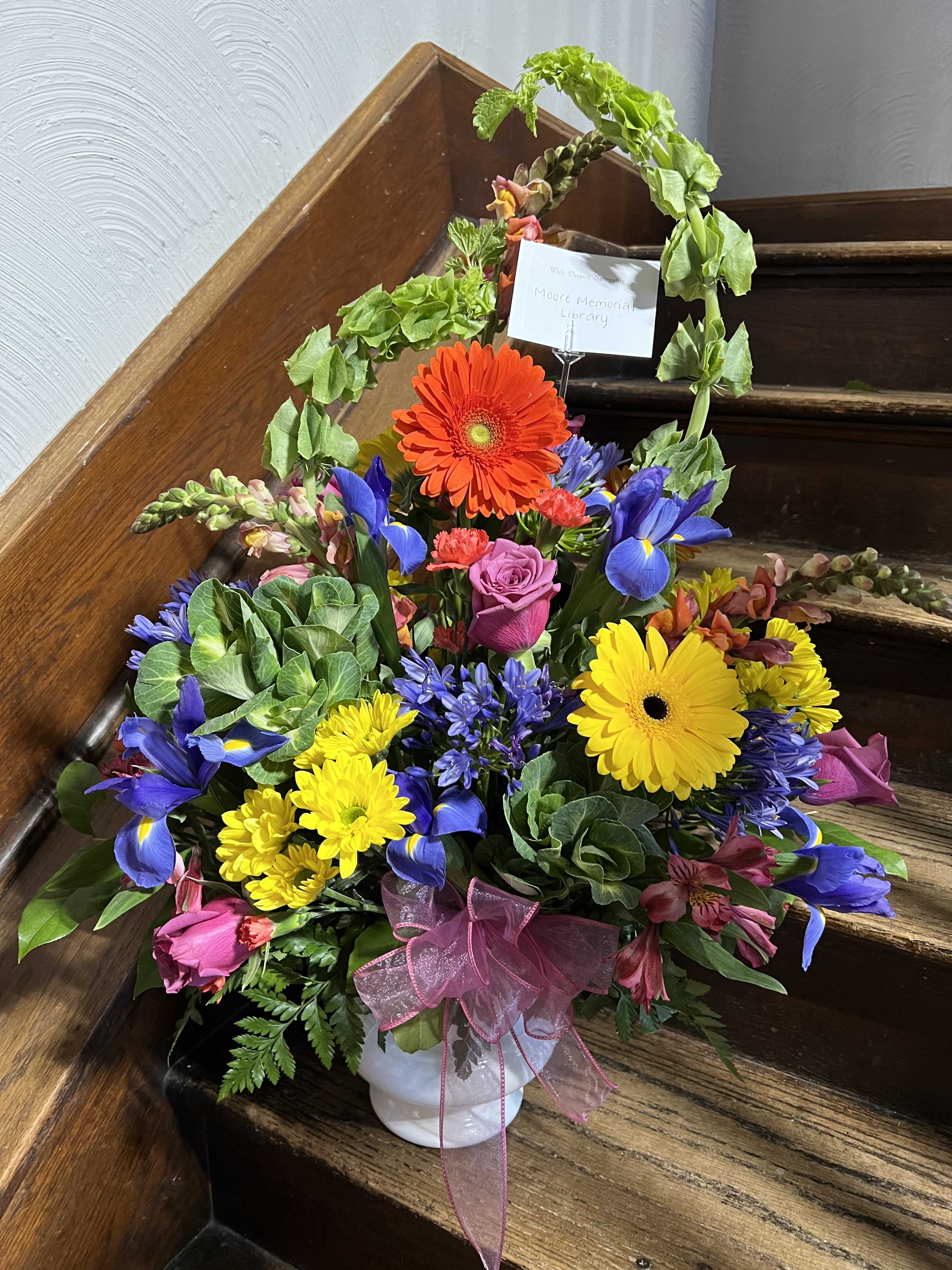 Sweet Thoughts Arrangement Sweet Thoughts Arrangement - Send a bright colored flower arrangement to let them know you are thinking of them