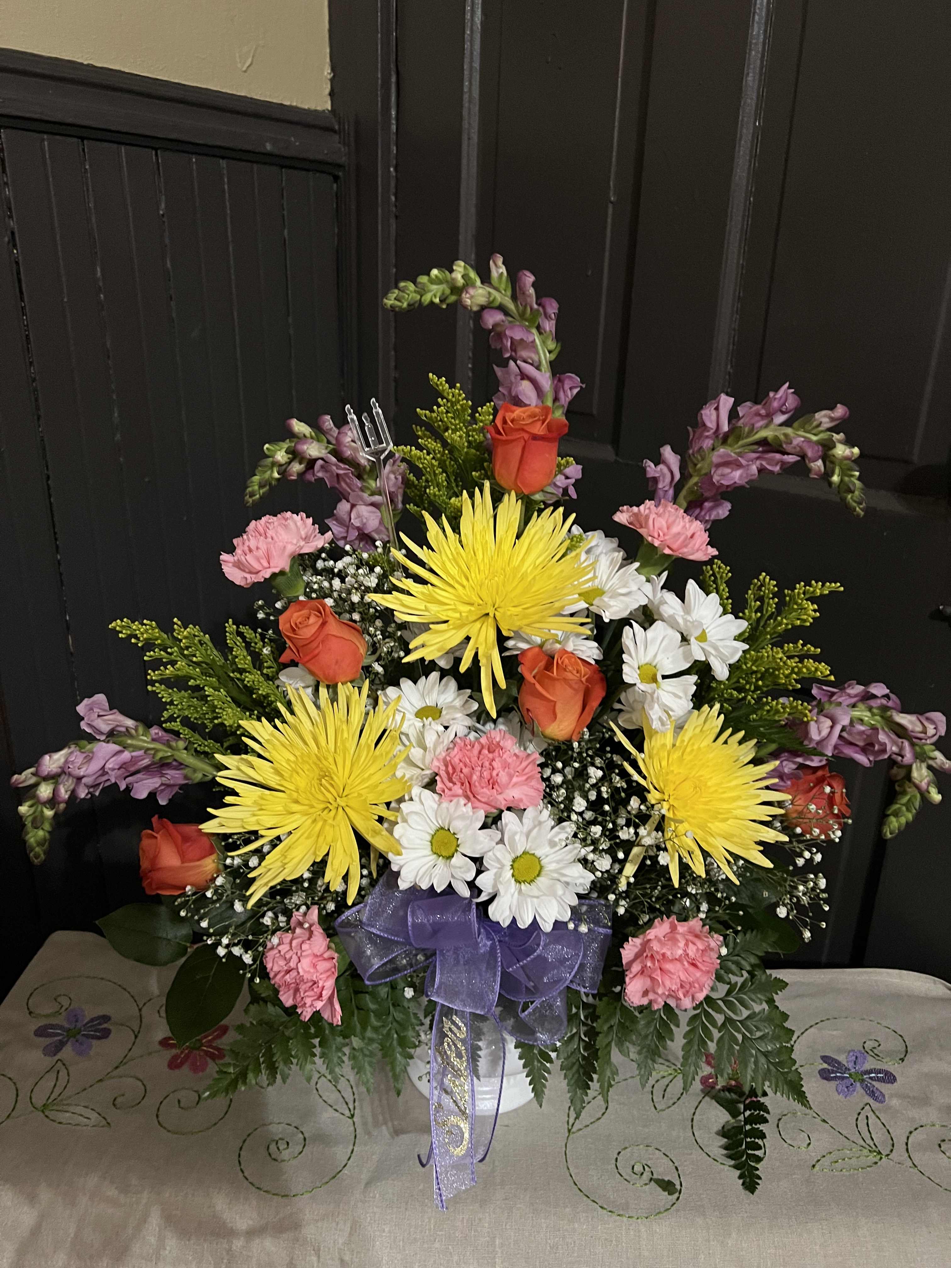Treasured Memories Bouquet Treasured Memories Bouquet - An array of different colored flowers arranged in an urn style vase