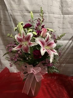 Lily Love Bouquet Lily Love Bouquet - A lovely bouquet of pink with accents of purple.