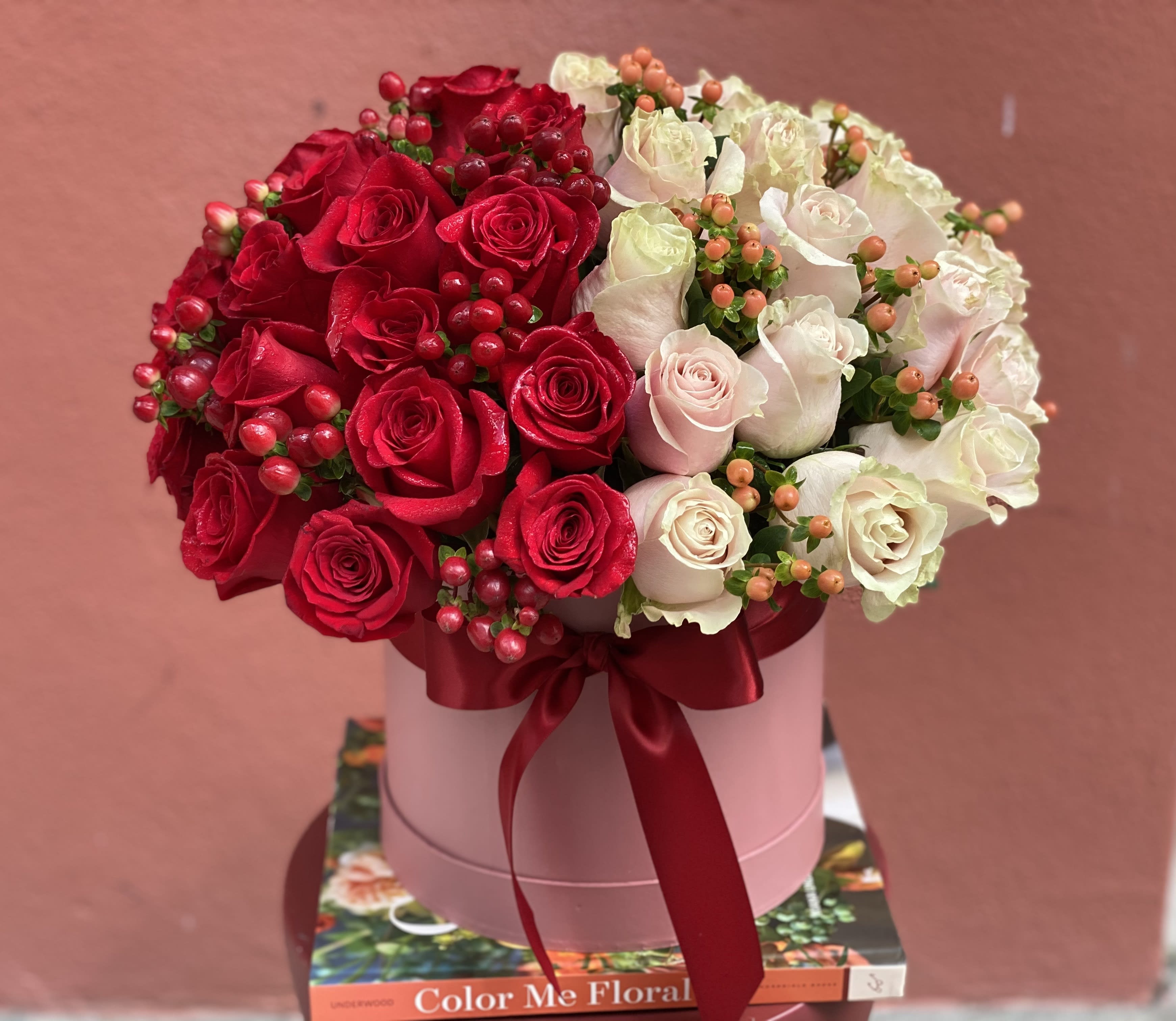 OH! THIS BOX FULL OF ROSES - This box is the perfect gift to show your love. Full of roses, all high quality, big headed. We can make it bicolor or all red, or all pink. You just let us know your preference  in &quot;message for the florist&quot;, while placing your order.  The size of the box is 10&quot; diameter x 7.5&quot; height. Once we place the flowers, the whole arrangement will be aprox 20&quot; diameter and 14.5&quot; height.