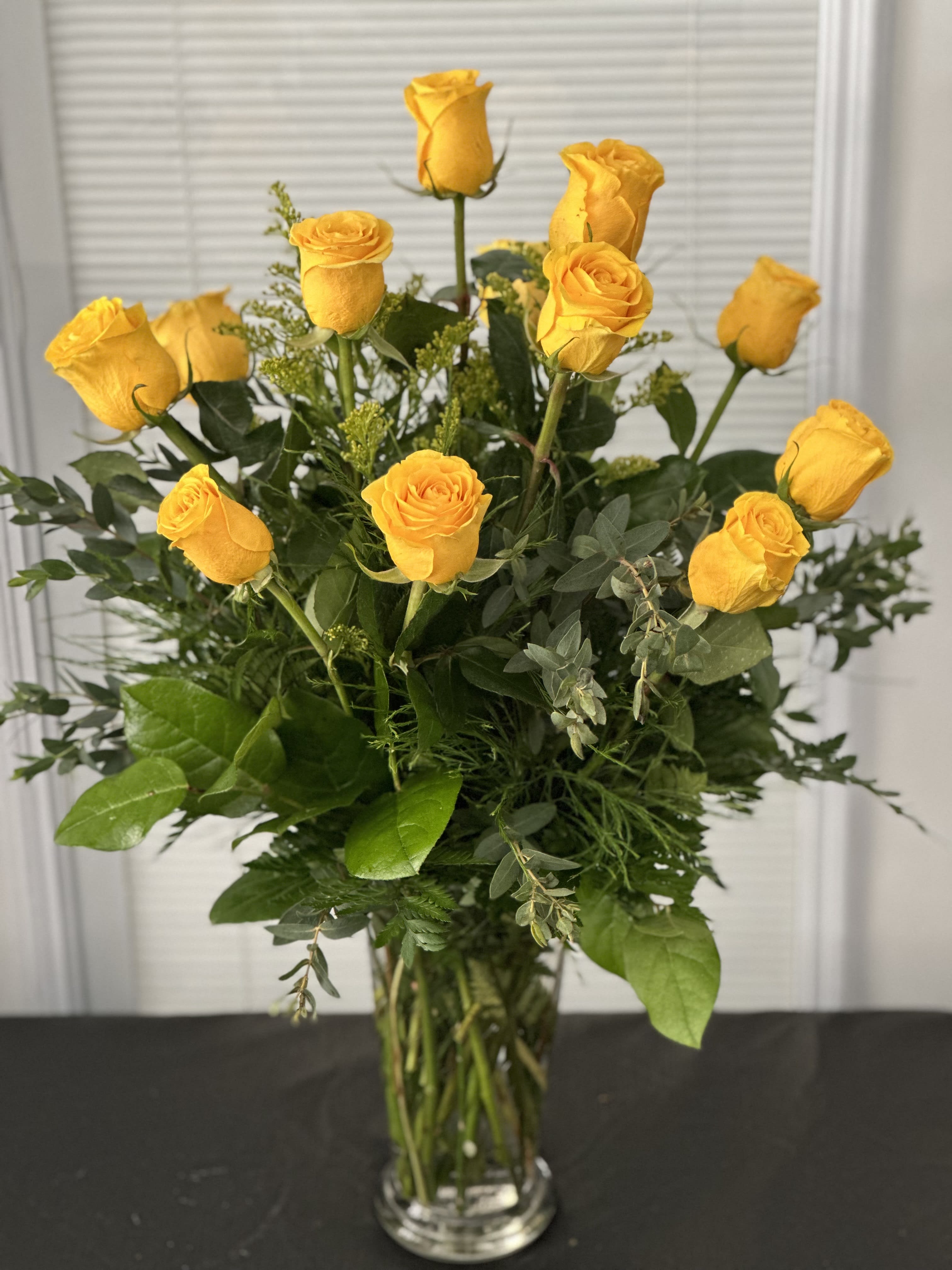 Rosy Glow Bouquet - Yellow roses symbolize friendship and sending this sunny bouquet of bright yellow flowers is such a beautiful way to celebrate a special bond. Destined to make anyone's day glow these roses are brilliant!
