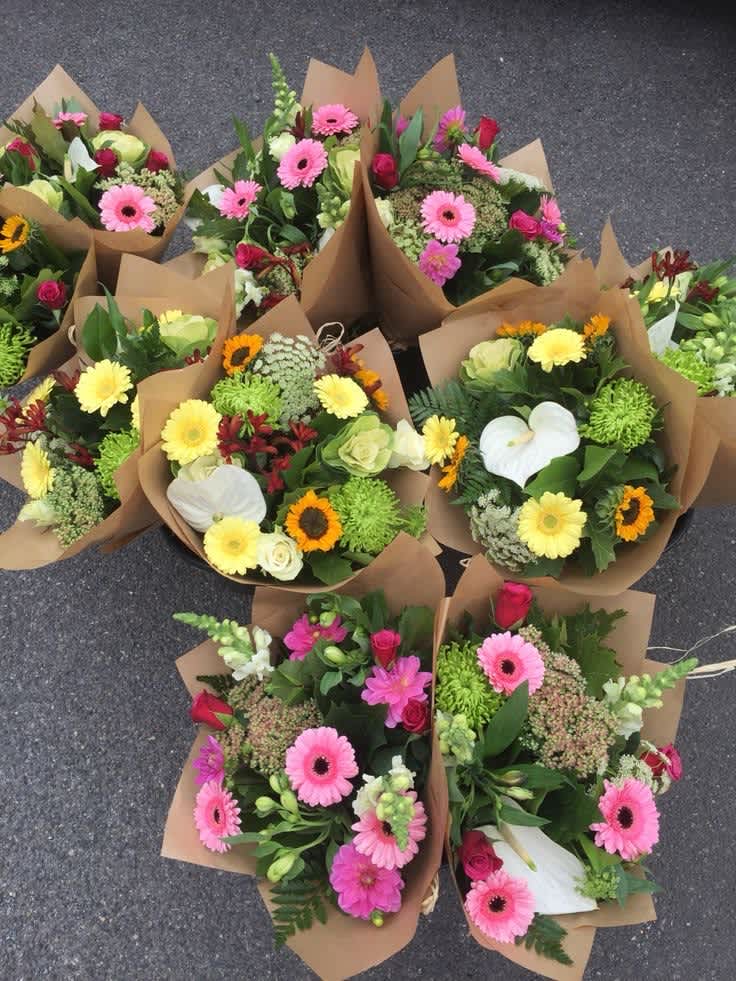 Hand tied bouquet  - Already have a vase? Our custom made mixed bouquets come wrapped in kraft paper ready to be plopped into a vase at home! Please note the general color scheme that you would like in your bouquet under SPECIAL INSTRUCTIONS. If there is no note, the bouquet will be a designer's choice.