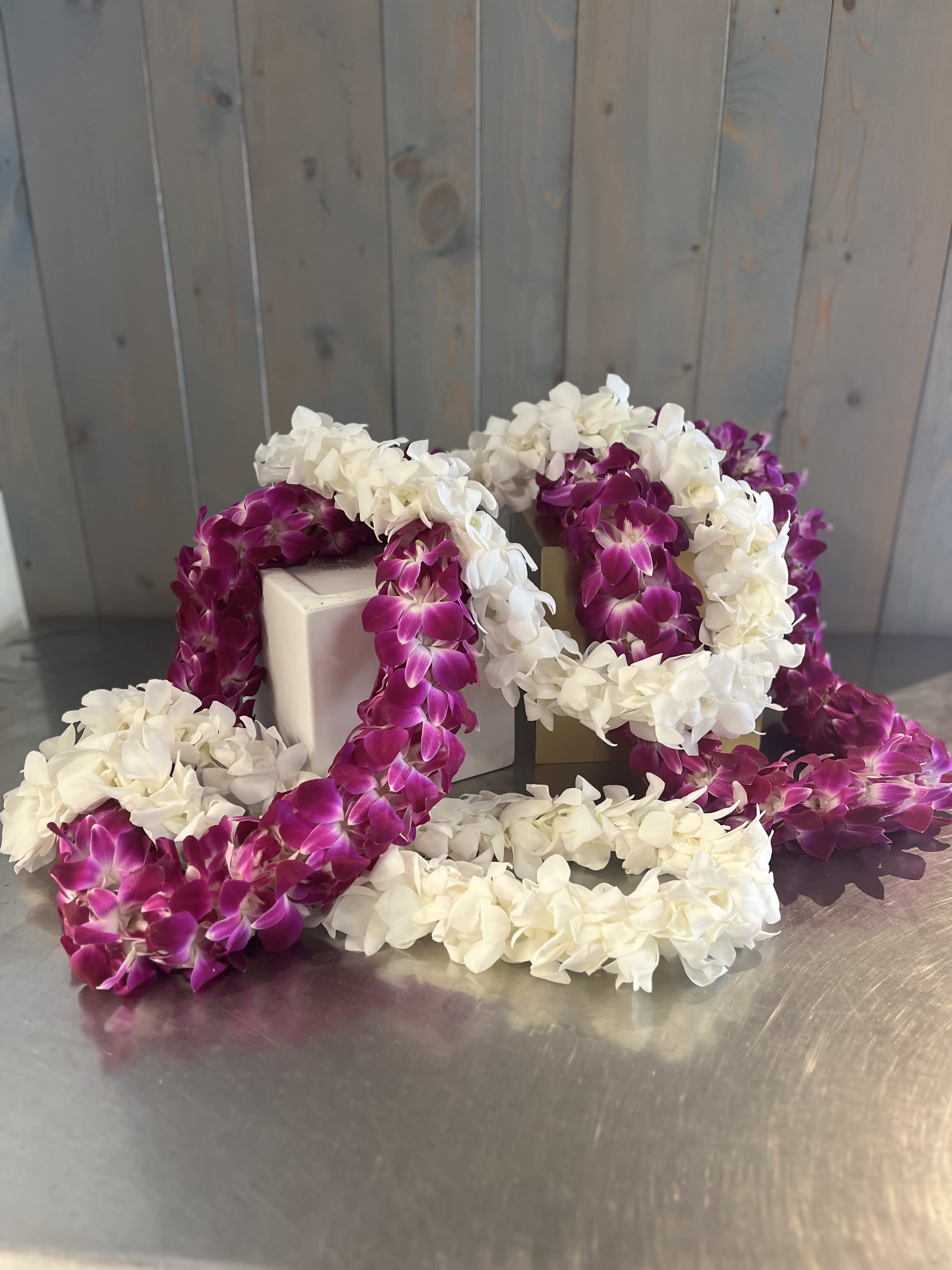Graduation Leis  - Honor that loved one with a beautiful handmade orchid leis  In store pick up only 