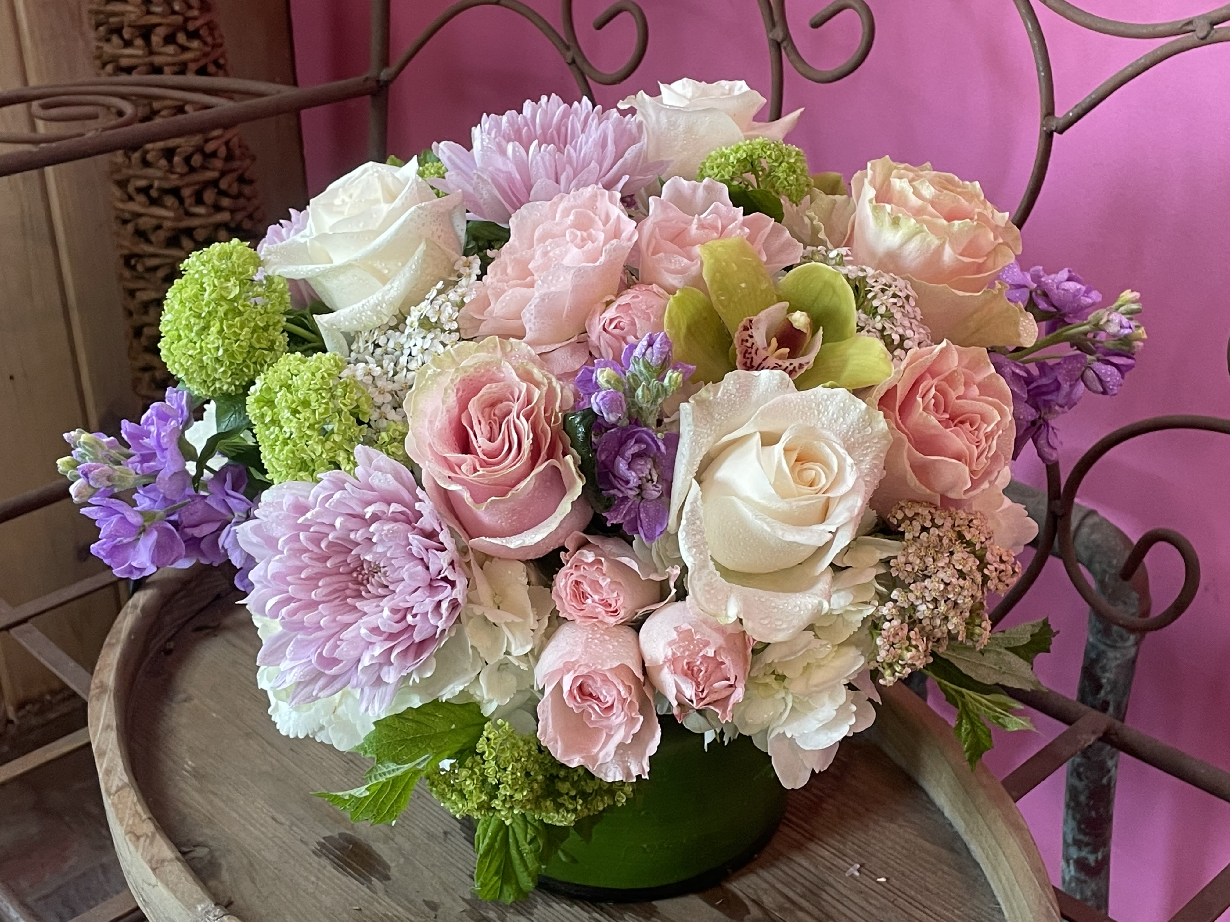 Princess Princess - Make any room feel like a fairy-tale with Princess! Our gorgeous bouquet of pink roses and white hydrangea will bring a sense of beauty, elegance, and royalty to your home or office. Let the natural aroma and soft colors of our unique floral arrangement inspire you and make every day feel like a true royal experience! Arranged in a 6x6 leaf lined vase featuring roses, hydrangea, cremons, orchids, seasonal filler and greenery.