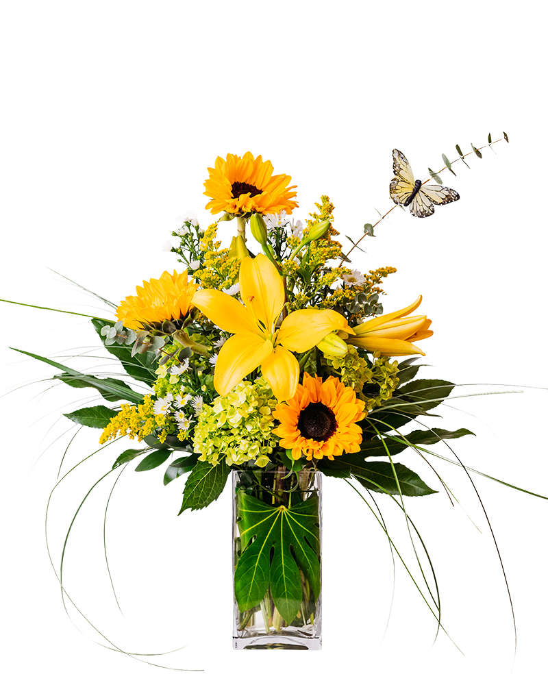 Taking Flight - Taking Flight's sunny yellows will have them soaring with happiness. Yellow lilies, sunflowers and other flowers are playfully arranged in this sunny arrangement.
